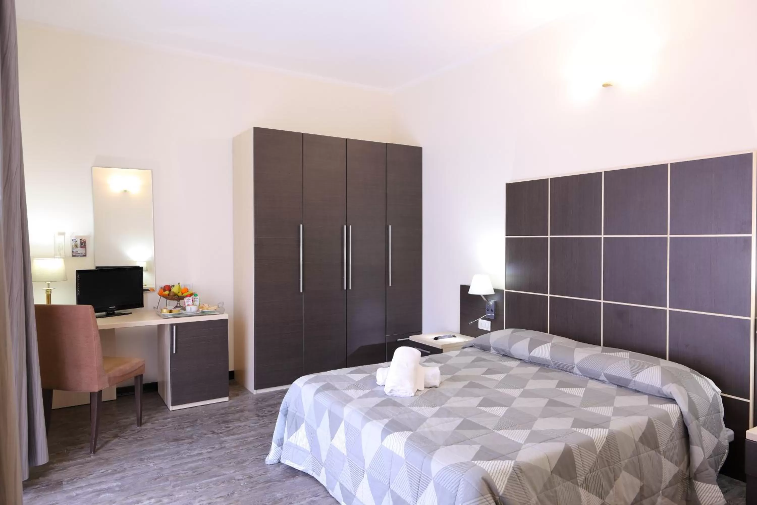 Bed in Hotel Ferrari