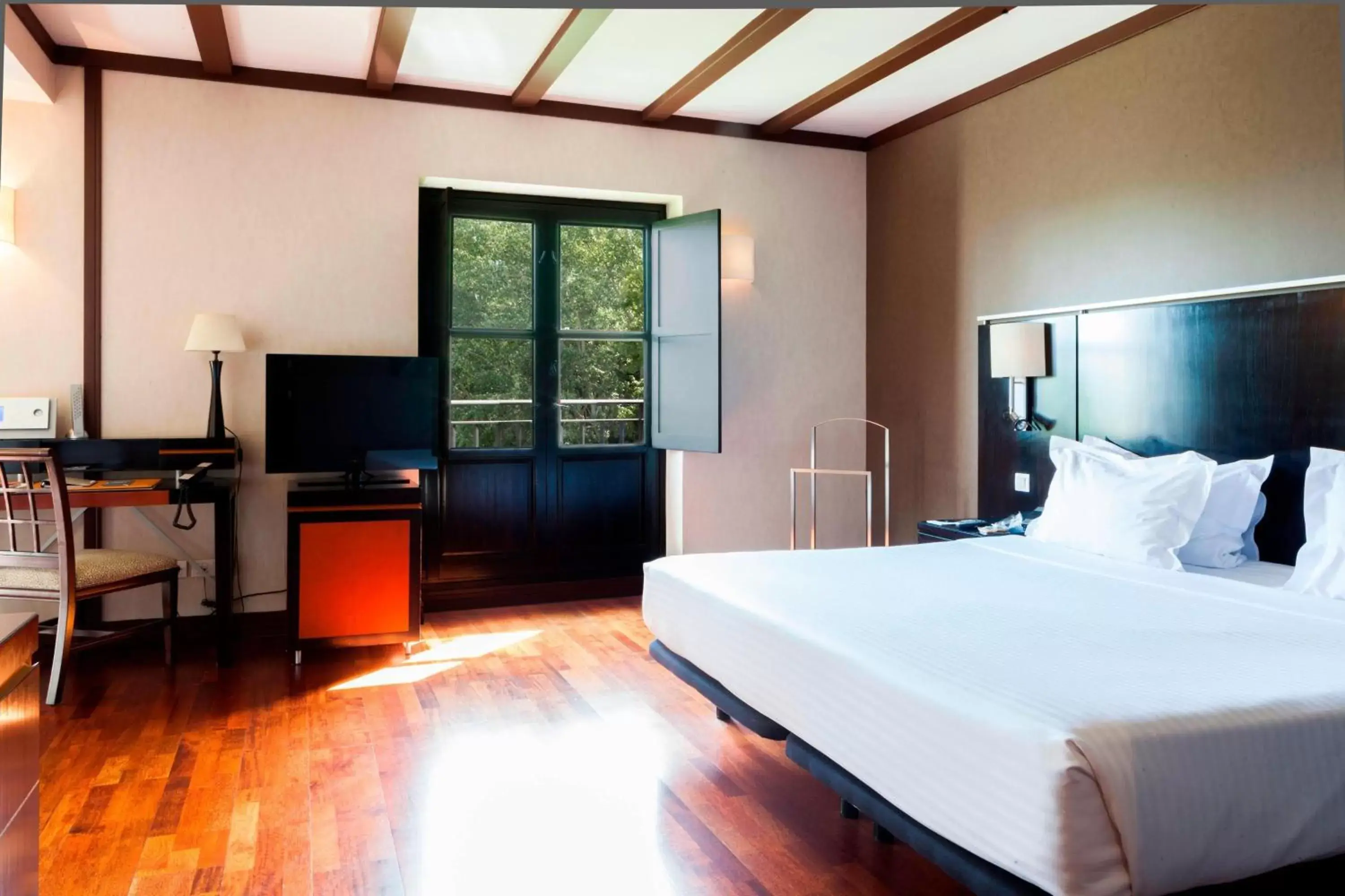 Photo of the whole room, Bed in AC Hotel Palacio de Santa Ana by Marriott