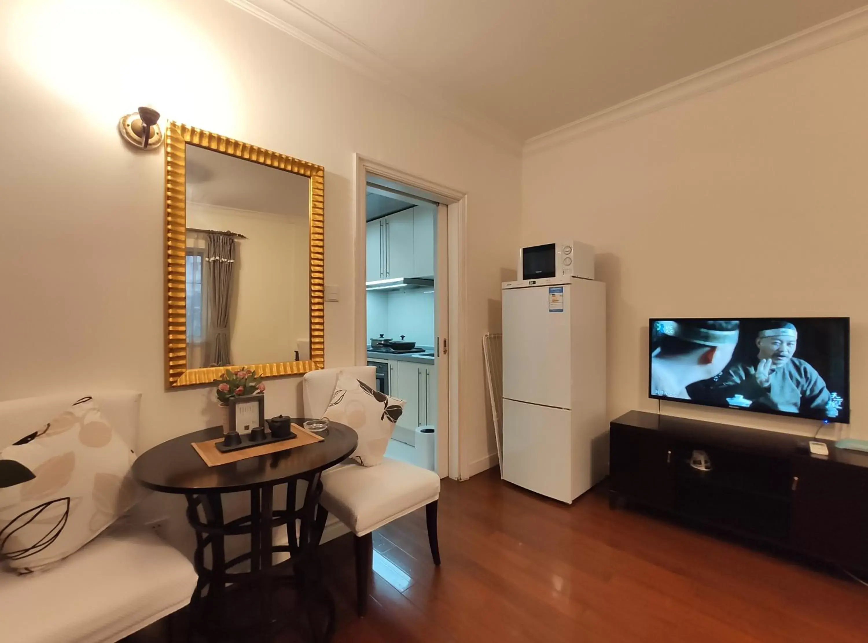 TV/Entertainment Center in Ladoll Service Apartments