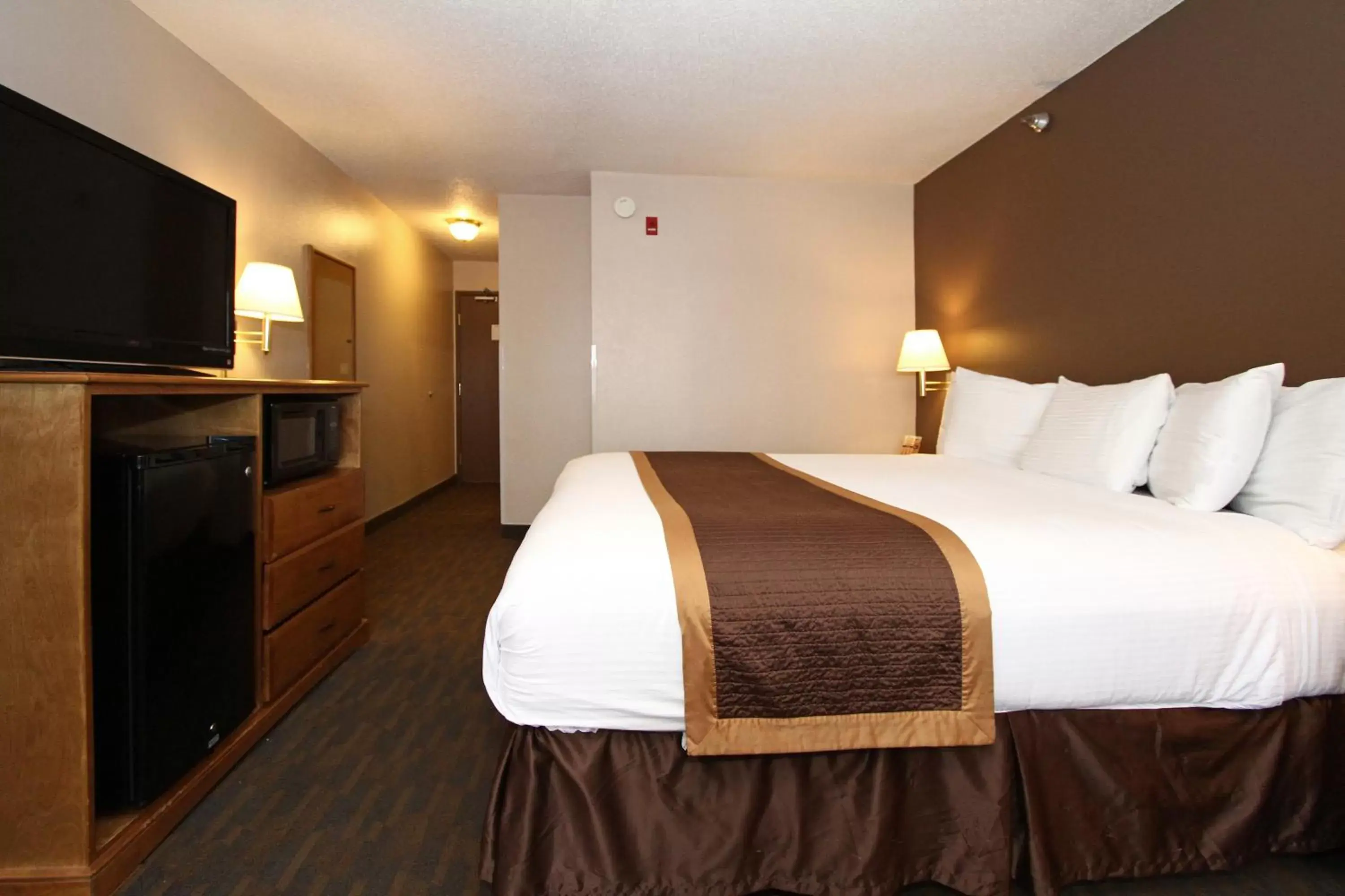 Bedroom in New Victorian Inn & Suites Lincoln