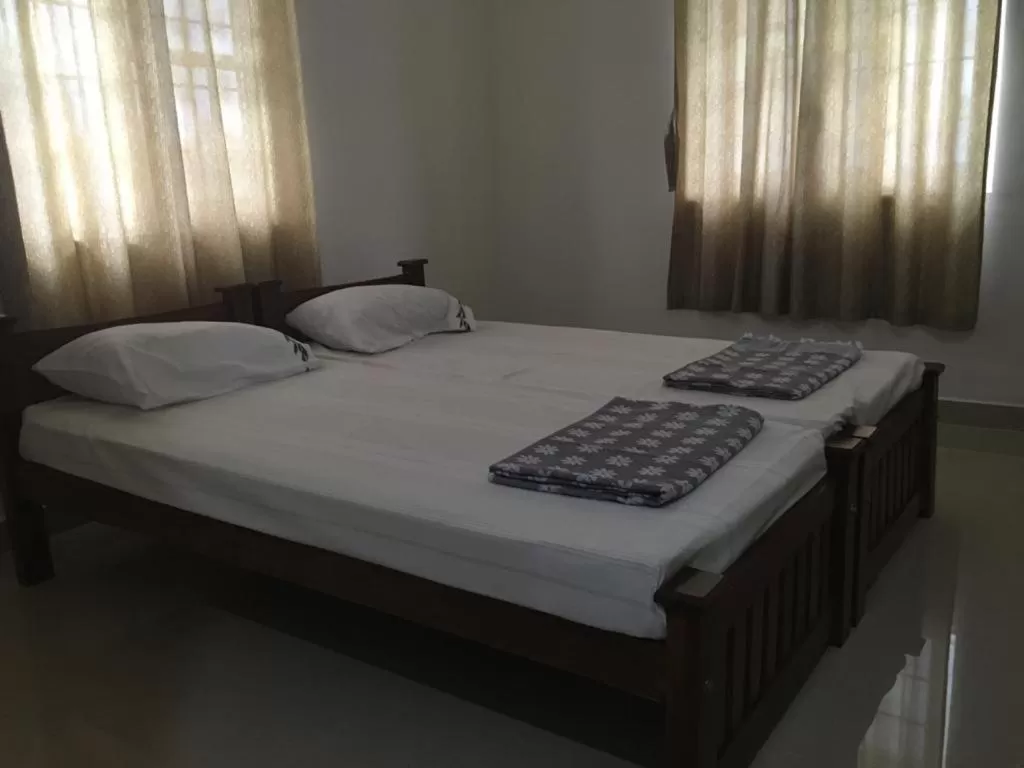 Bedroom, Bed in Shantham Service Apartments