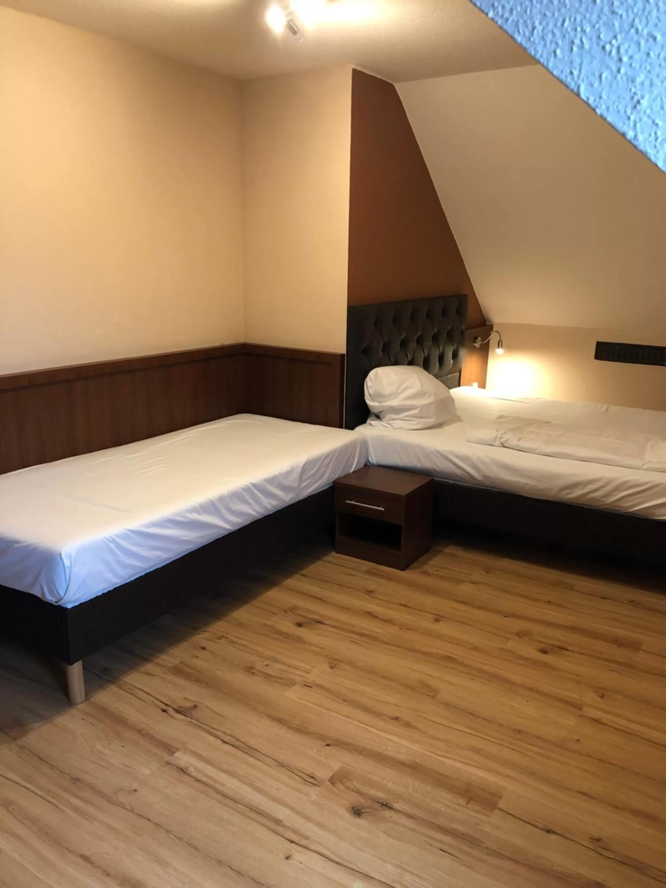 Bed in Hotel Poseidon