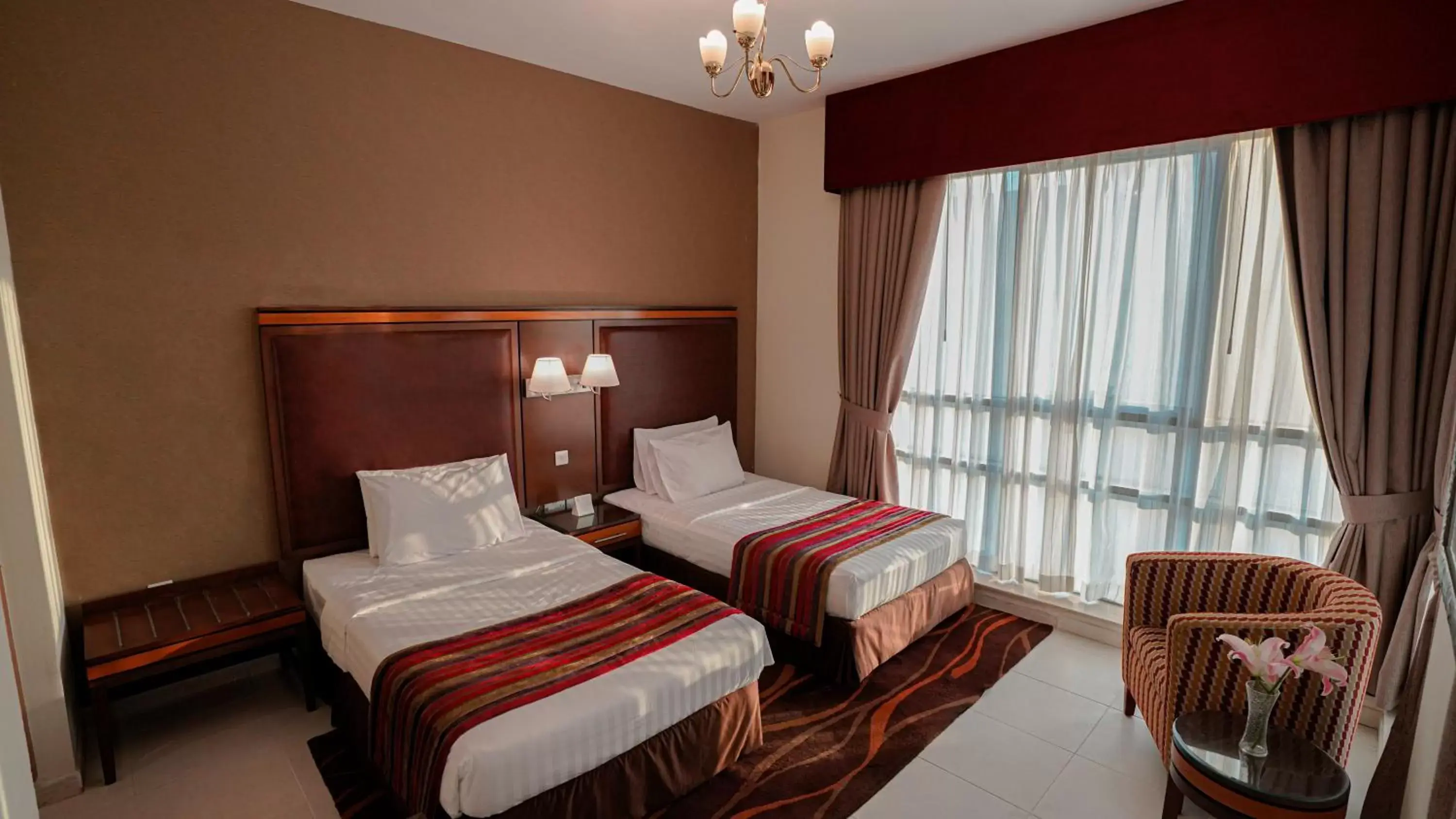 Bedroom, Bed in Xclusive Hotel Apartments