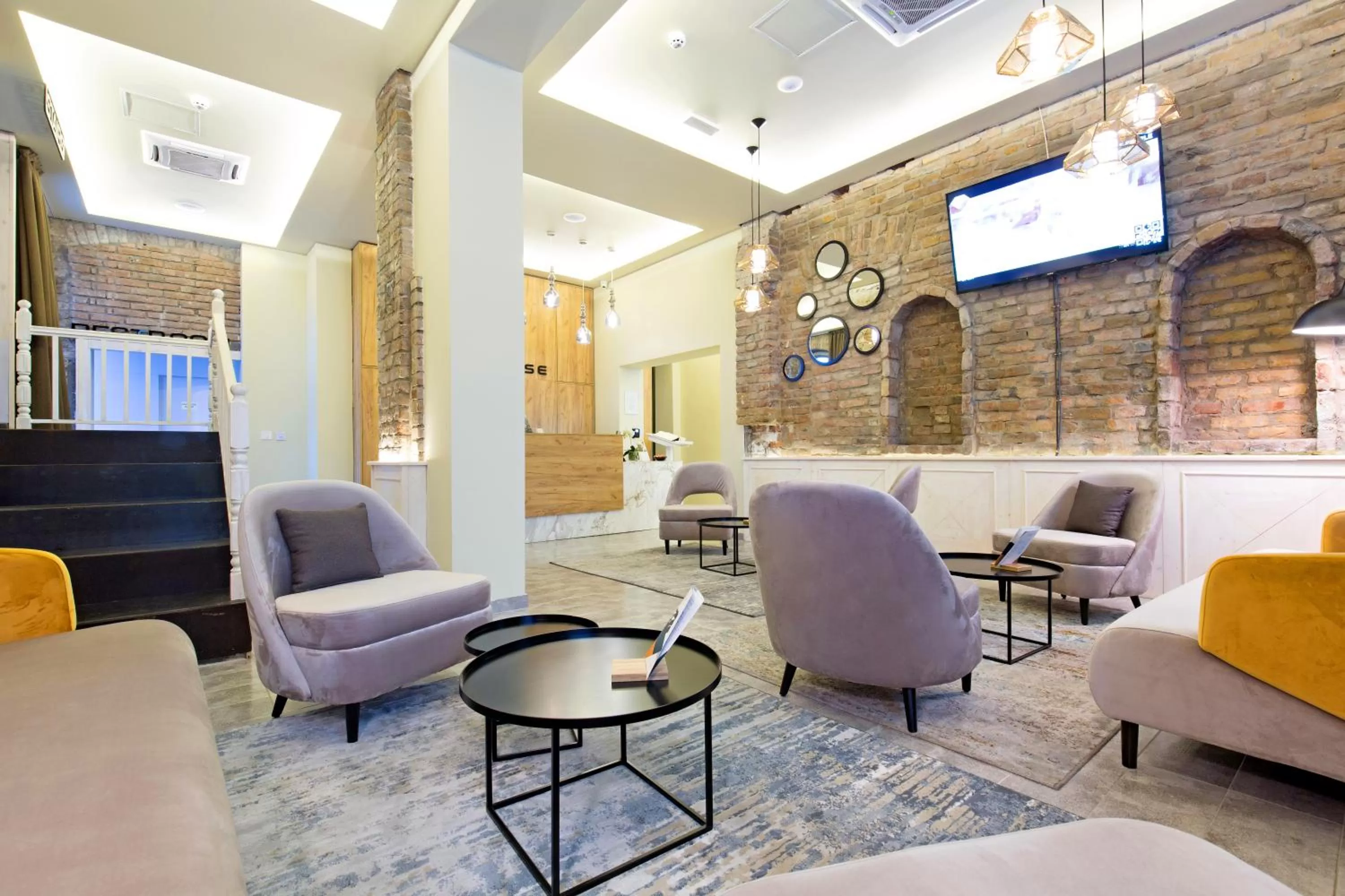 Communal lounge/ TV room in Marquise Hotel Garni