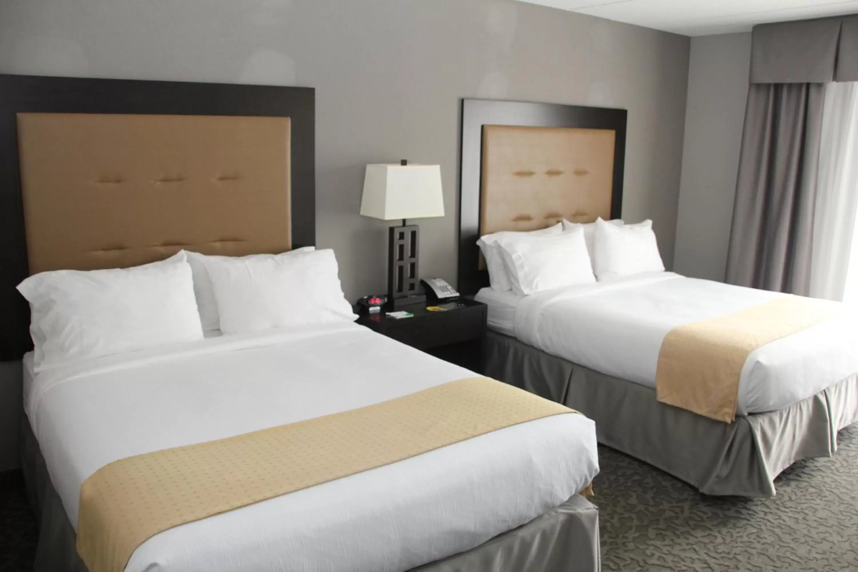 Photo of the whole room, Bed in Holiday Inn and Suites East Peoria, an IHG Hotel