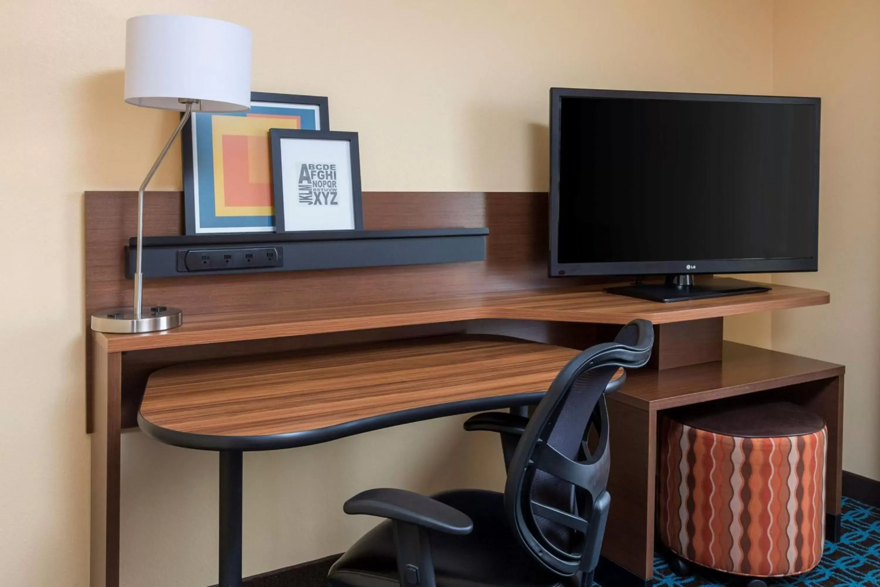 Photo of the whole room, TV/Entertainment Center in Fairfield Inn & Suites Lubbock