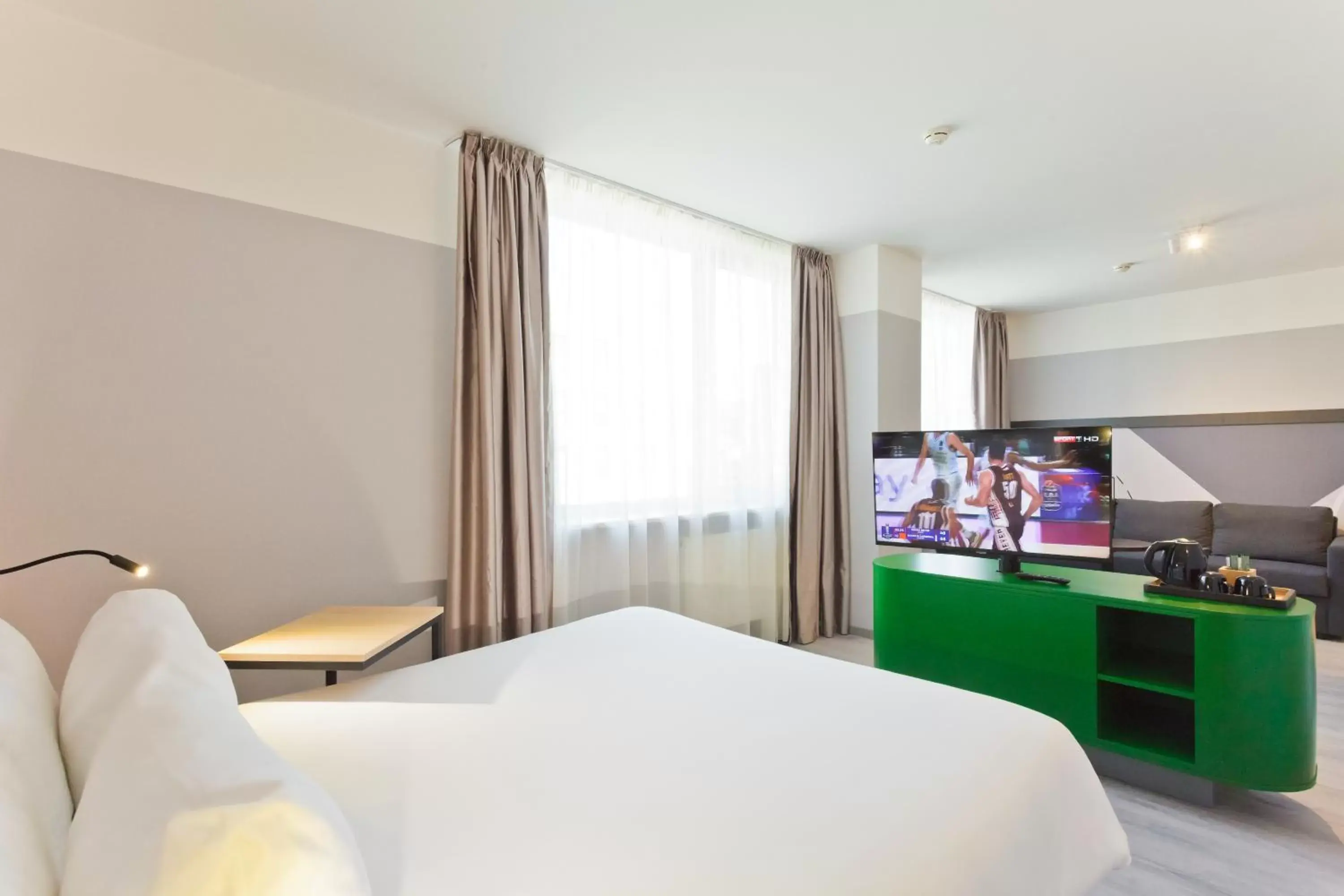 Bed in IBIS Styles Kaunas Centre