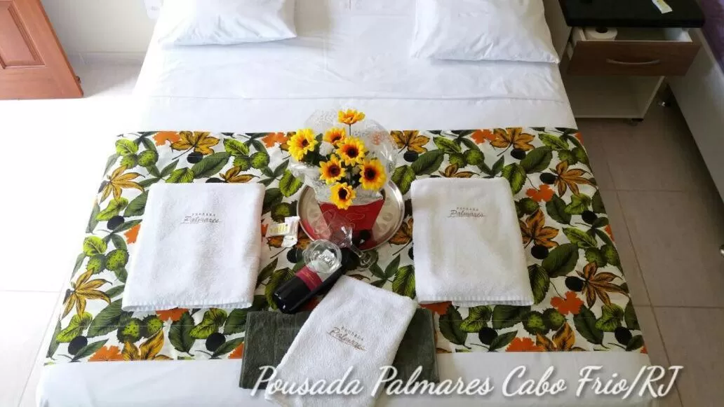 Bed in Pousada Palmares