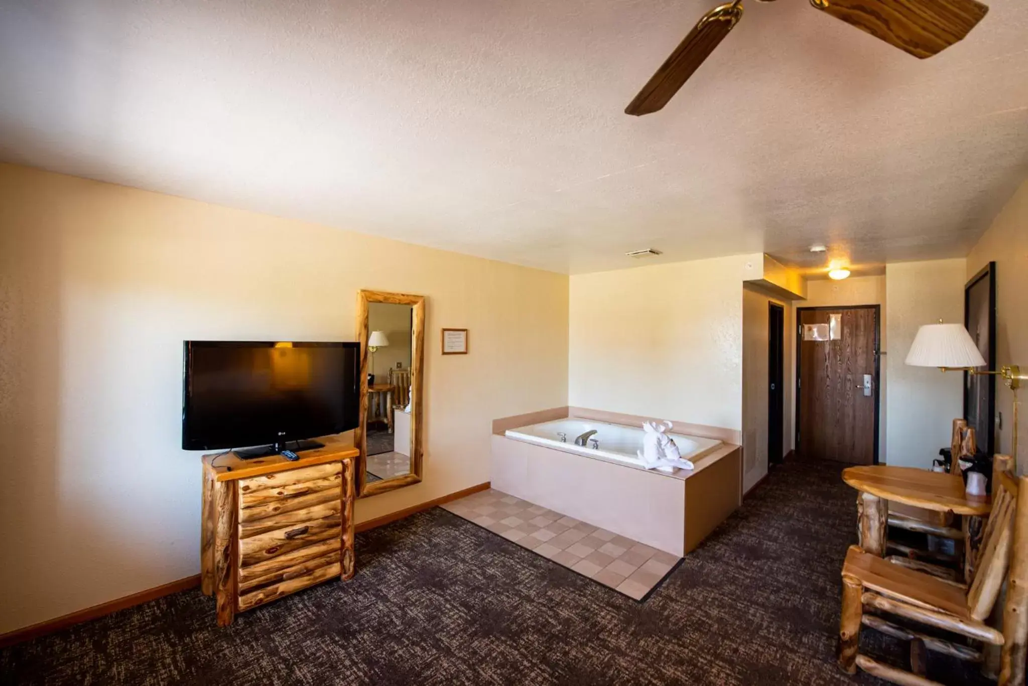 TV/Entertainment Center in Super 8 by Wyndham Bridgeview of Mackinaw City