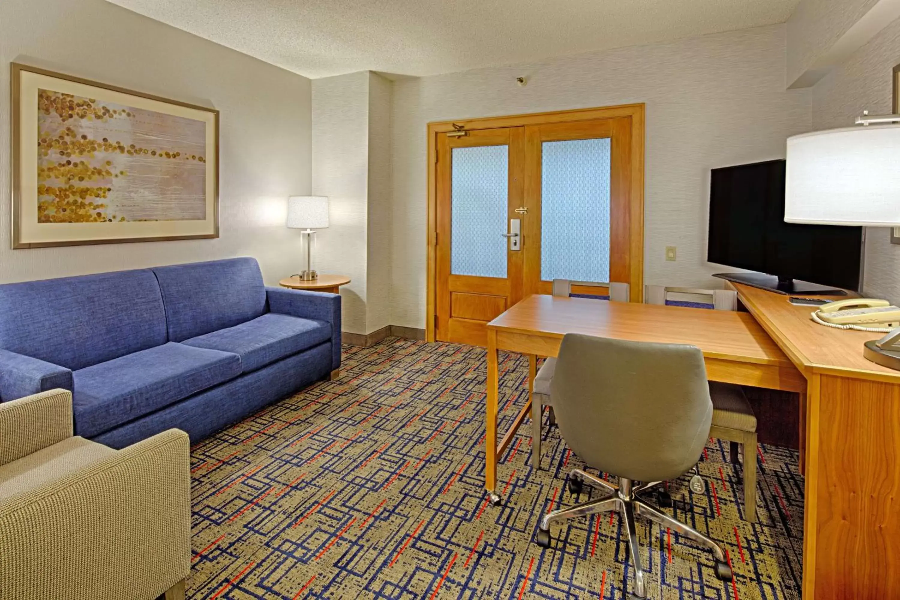 Bedroom, Seating Area in Embassy Suites by Hilton Chicago O'Hare Rosemont