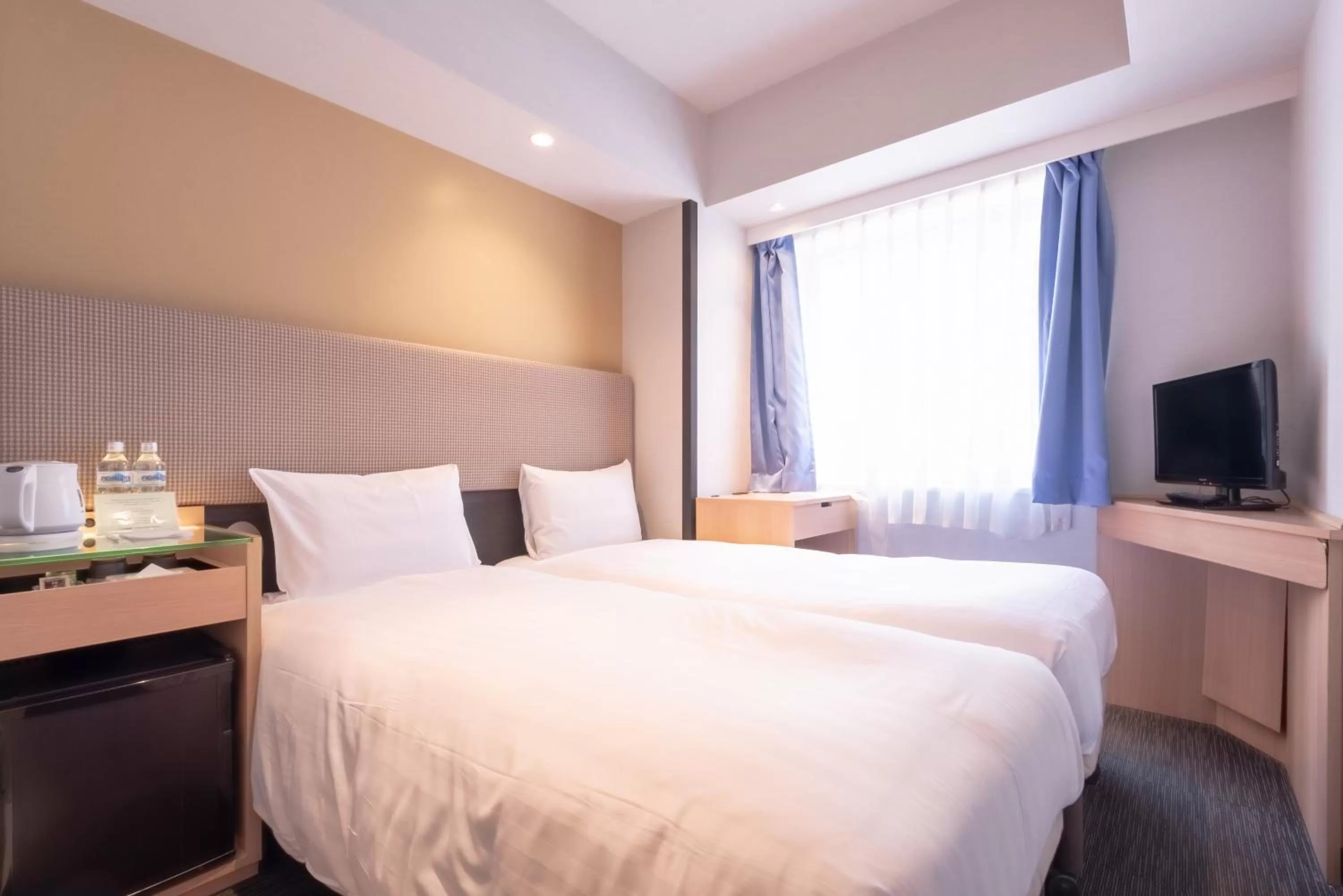 Bed in E Hotel Higashi Shinjuku