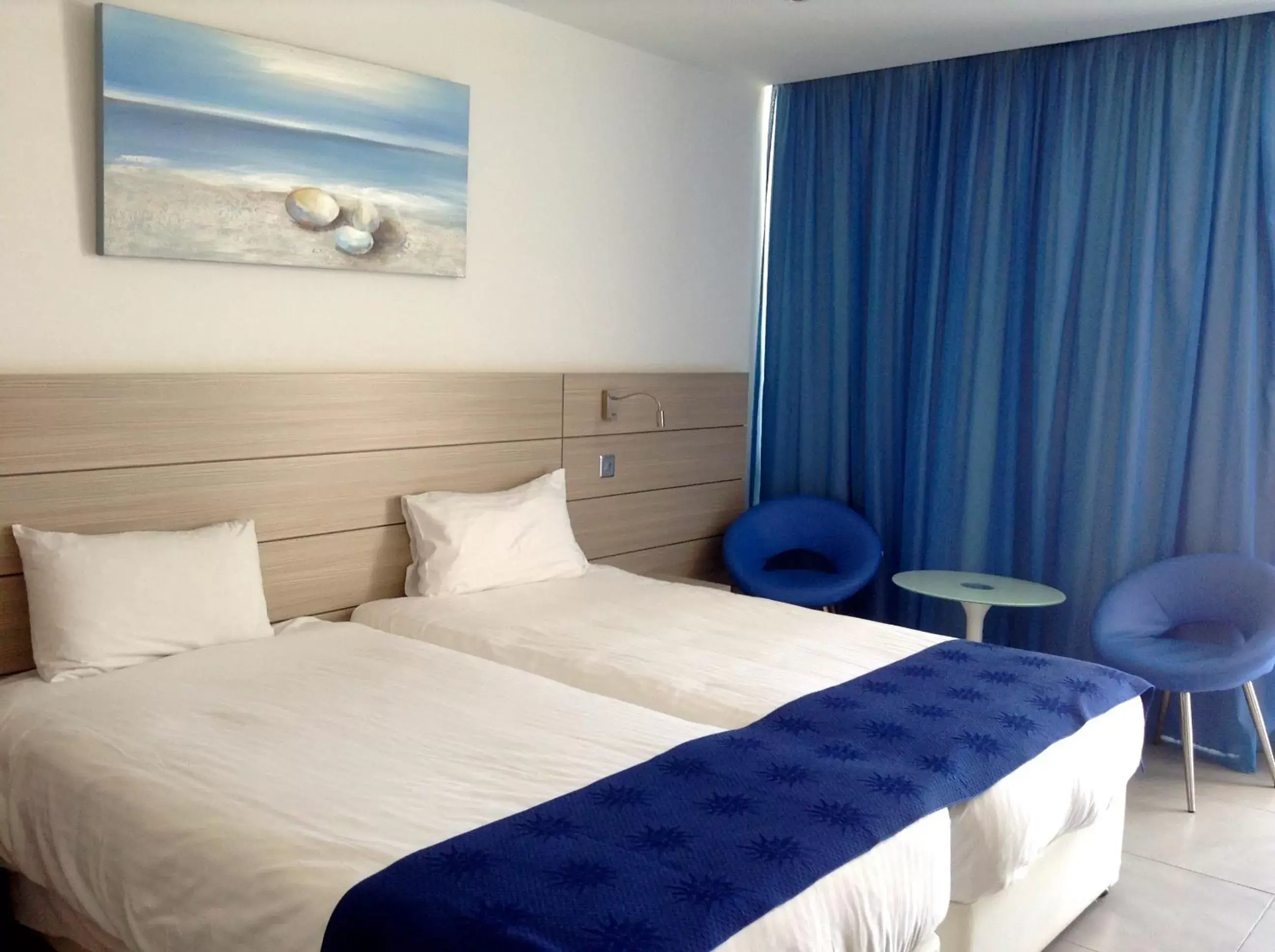 Photo of the whole room, Bed in Limanaki Beach Hotel & Suites