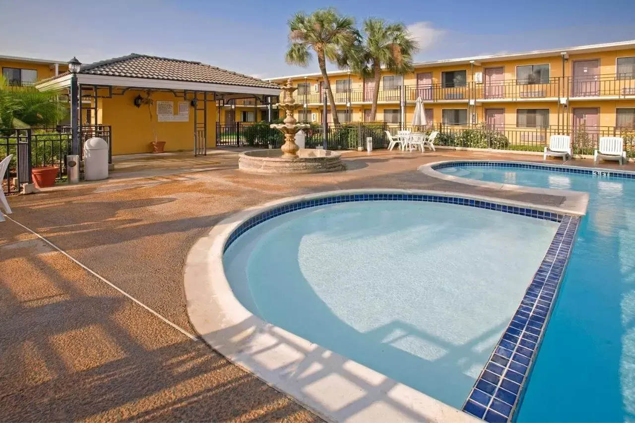 Property building, Swimming Pool in Americas Best Value Inn Laredo