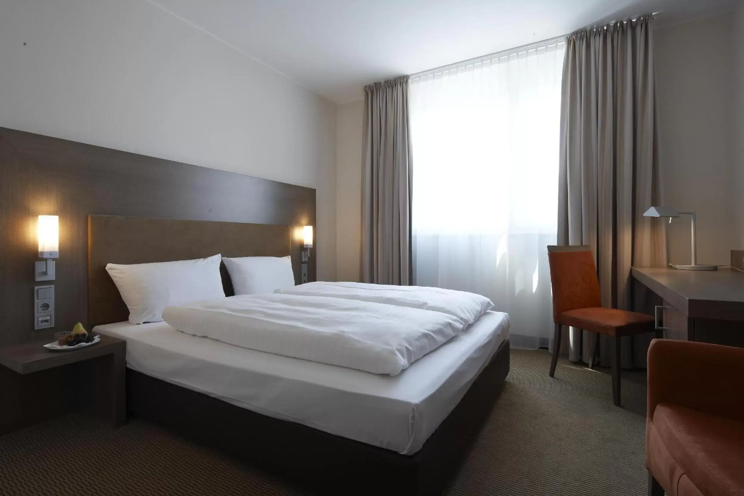 Bed in IntercityHotel Essen