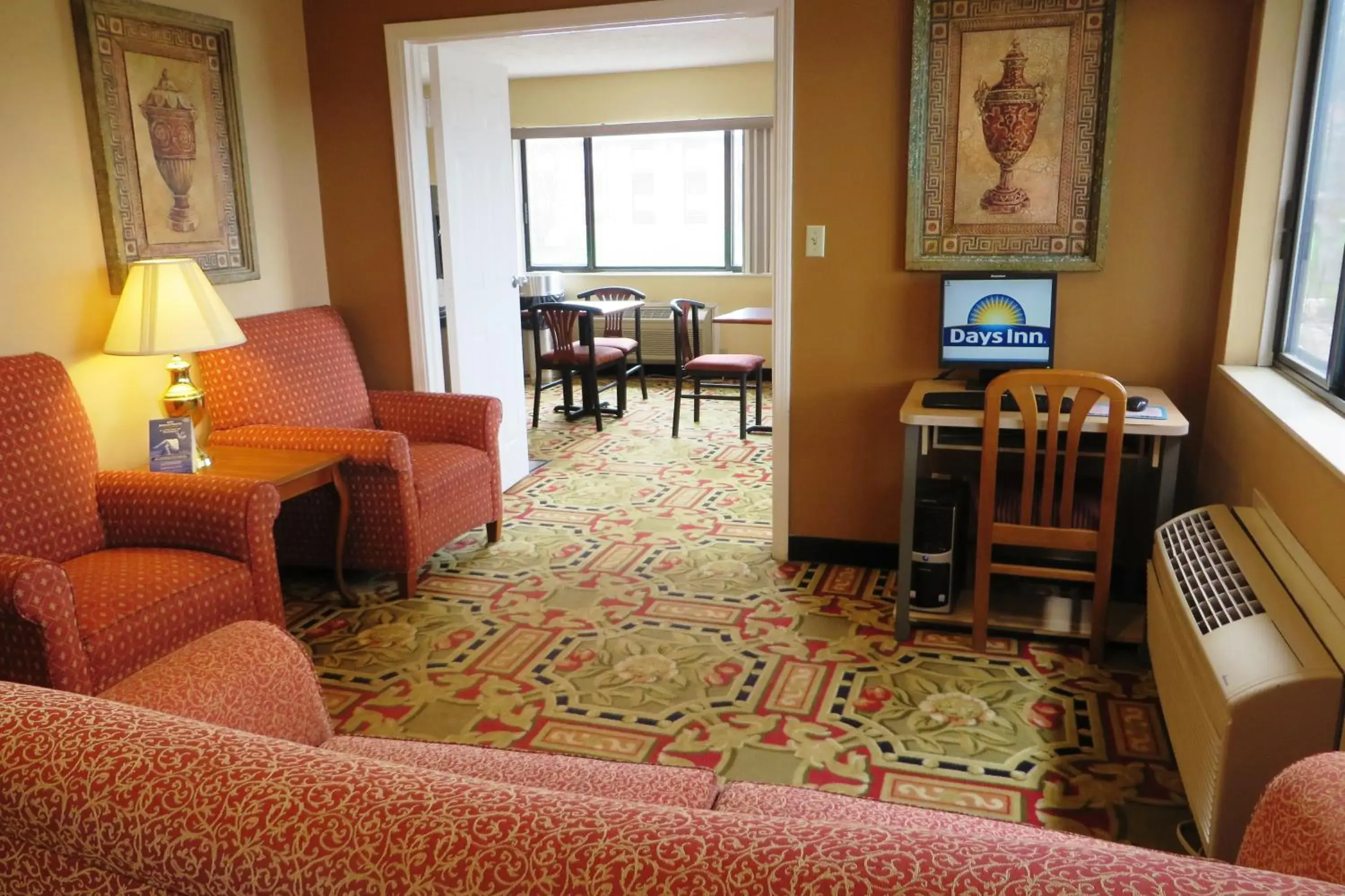 Communal lounge/ TV room, Seating Area in Days Inn by Wyndham Plainfield
