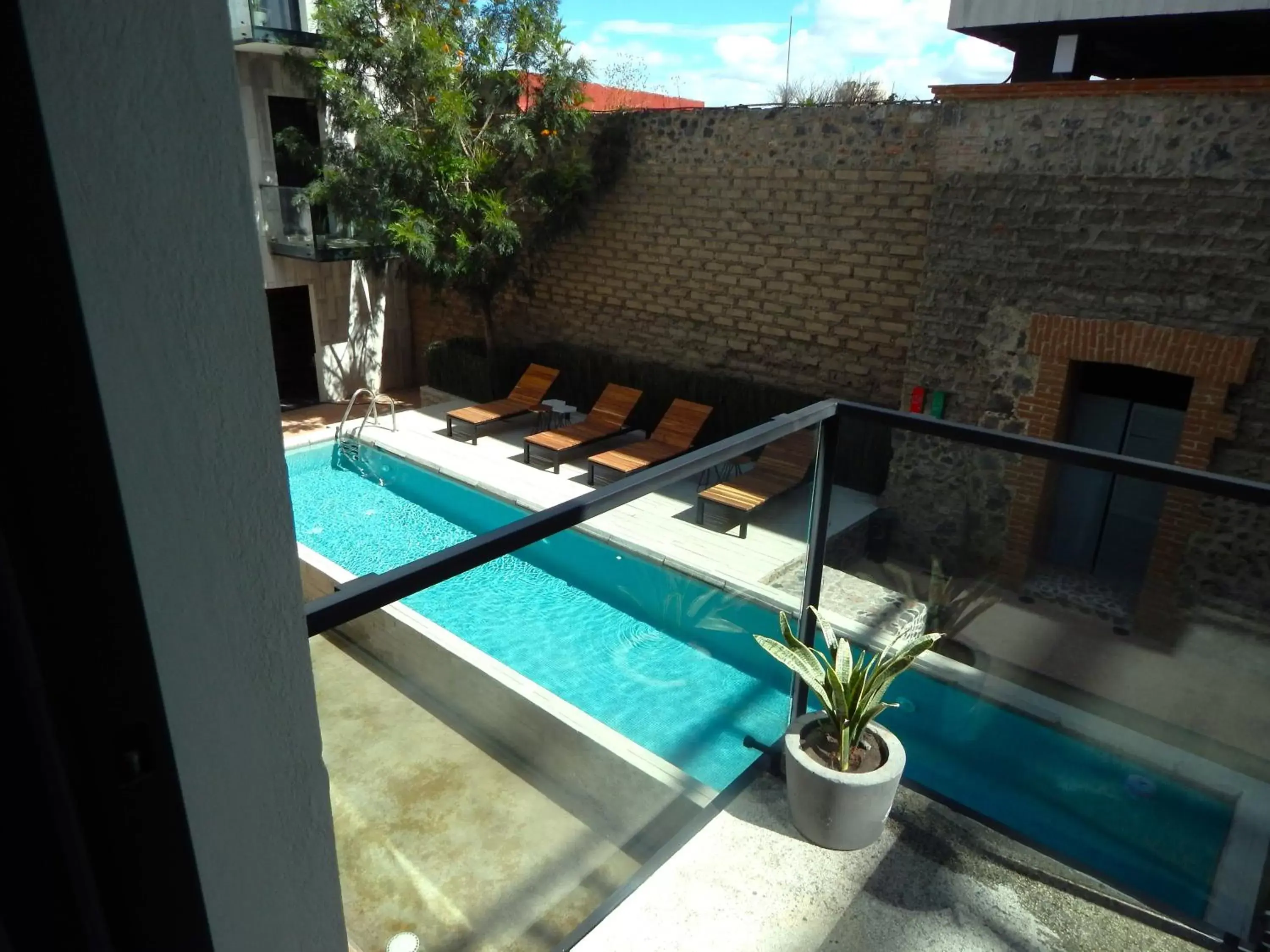 Patio, Pool View in Hotel Tila