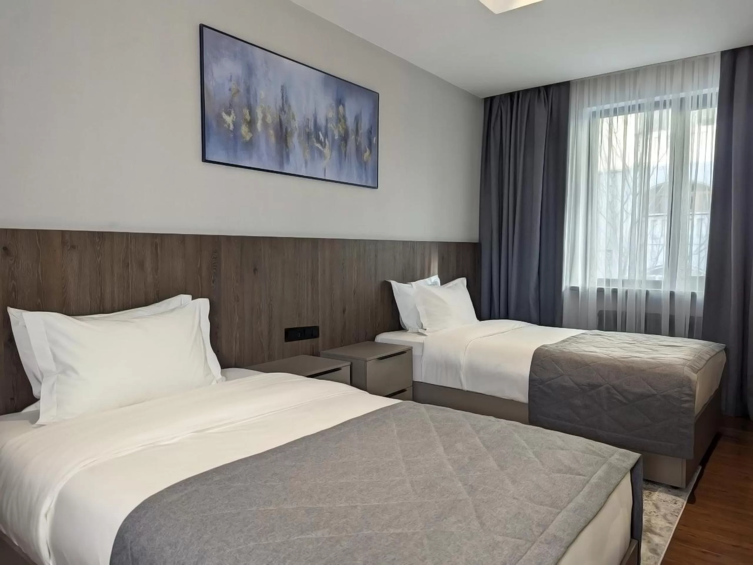 Bed in Raavah Aparthotel