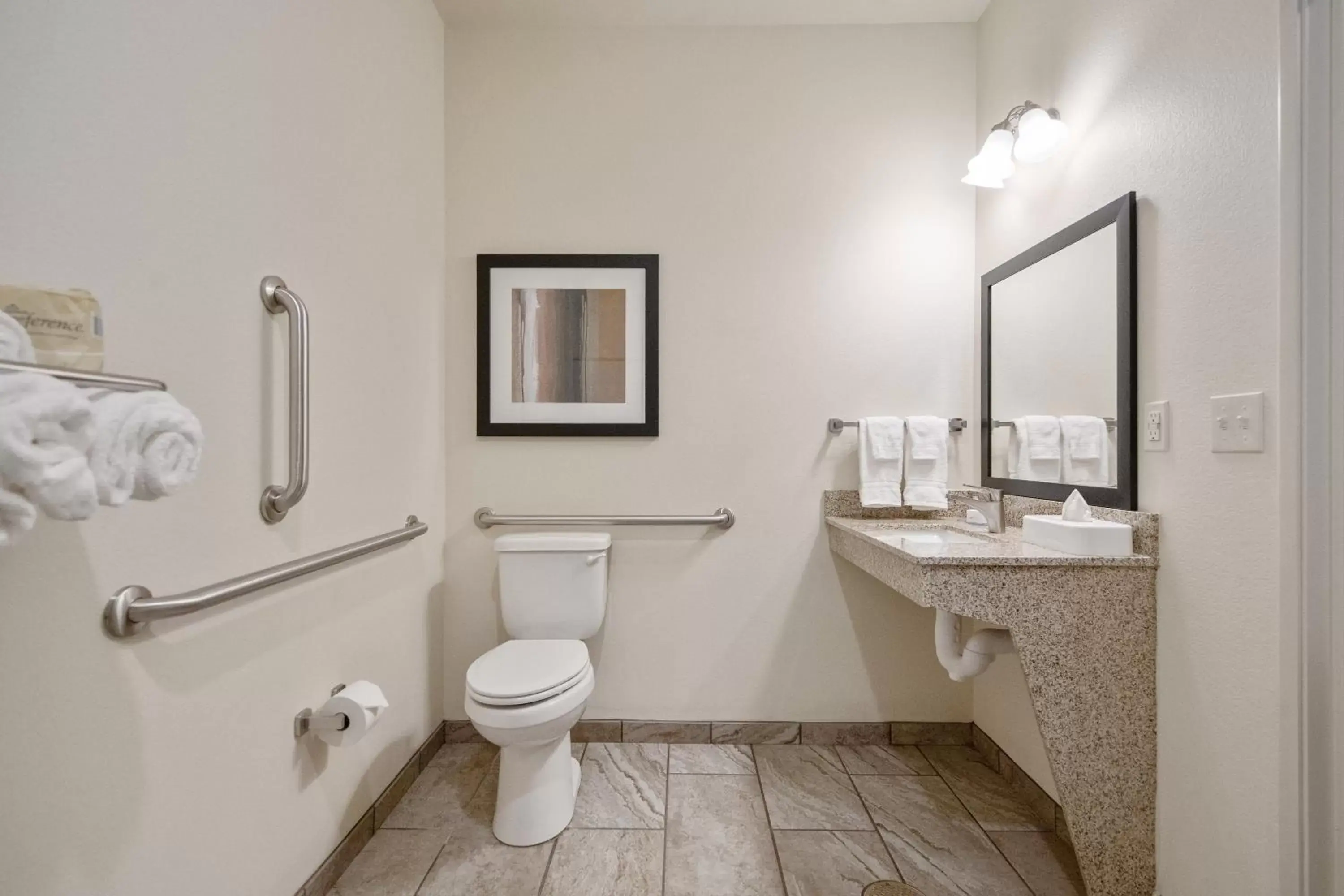 Toilet, Bathroom in Cobblestone Hotel & Suites - Two Rivers