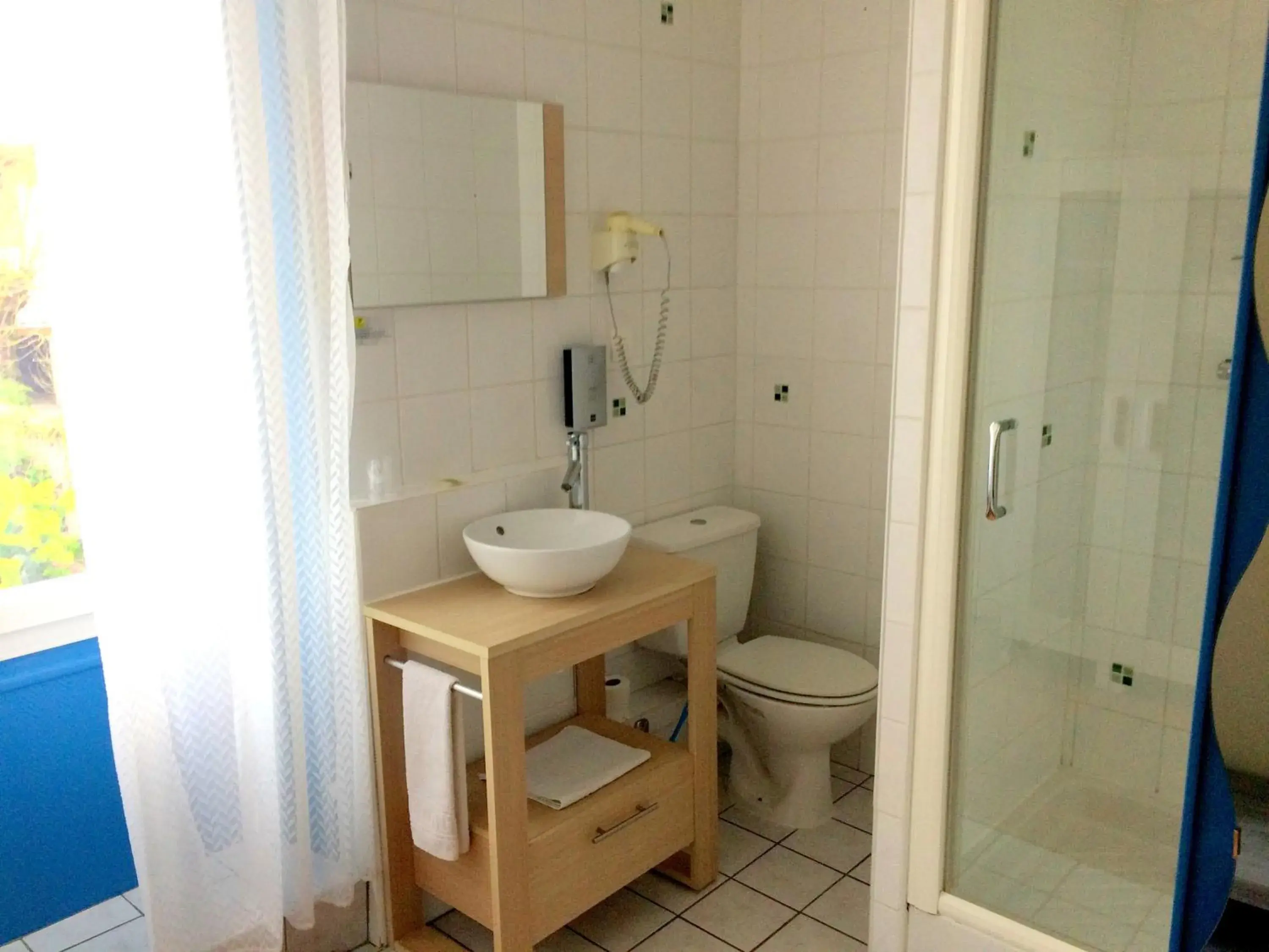 Bathroom in Logis Hotel L'Occitan