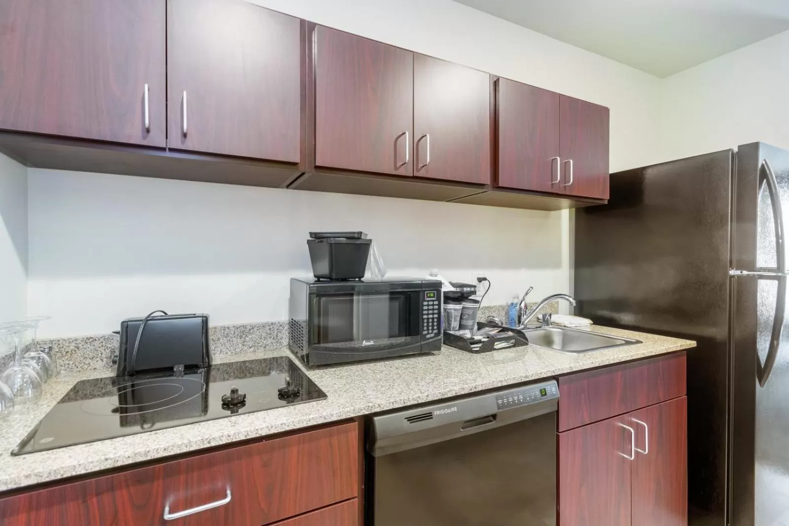 Kitchen or kitchenette in Cobblestone Hotel & Suites - Janesville
