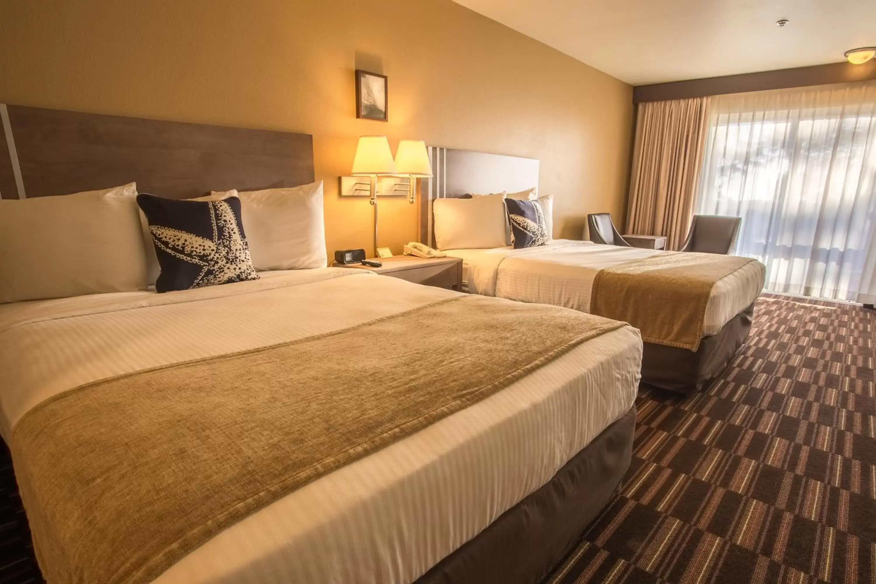 Deluxe Queen Room with Two Queen Beds in Inn at Wecoma Deluxe Queen Room with Two Queen Beds in Inn at Wecoma