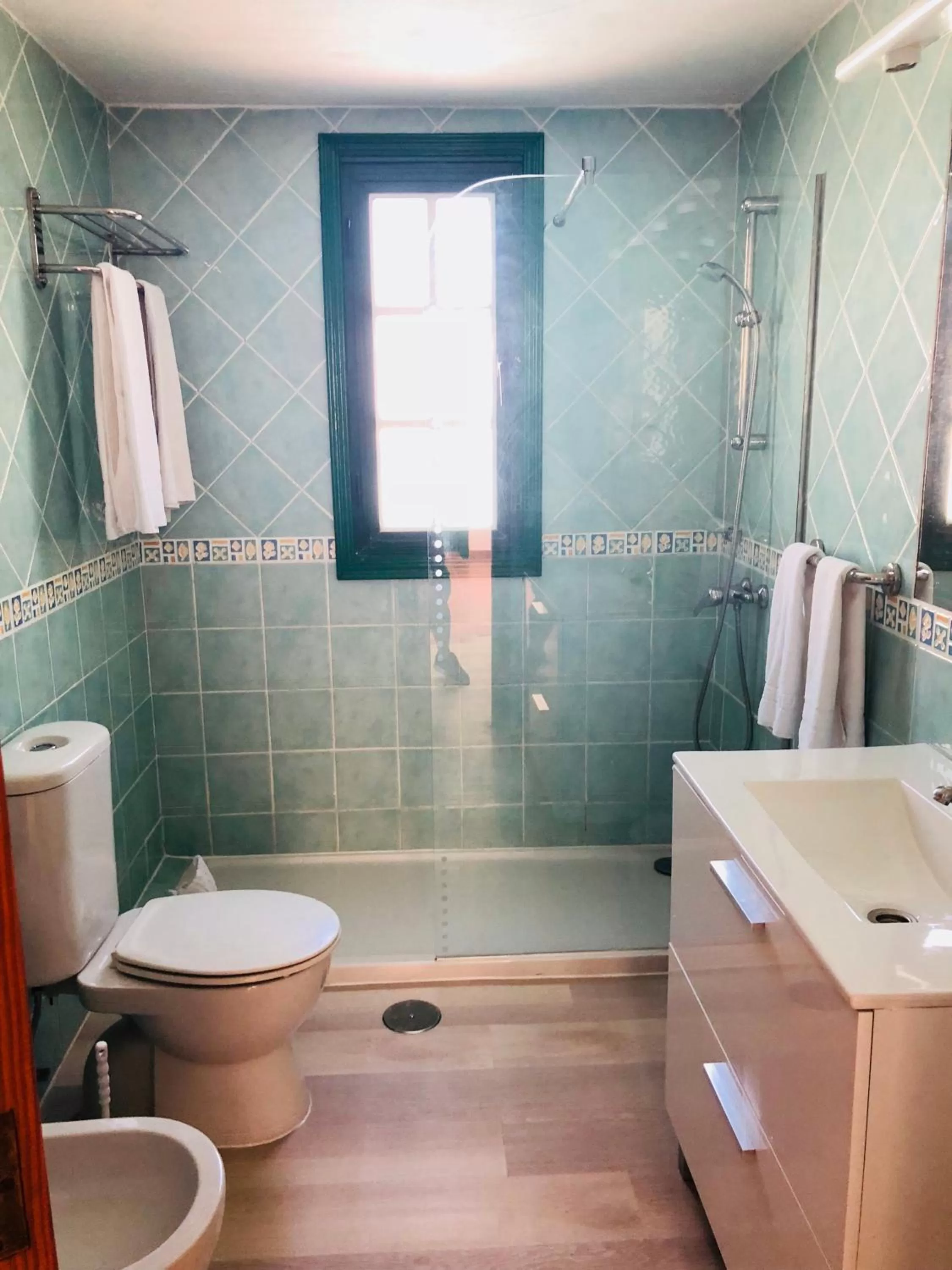 Bathroom in Regency Torviscas Apartments and Suites