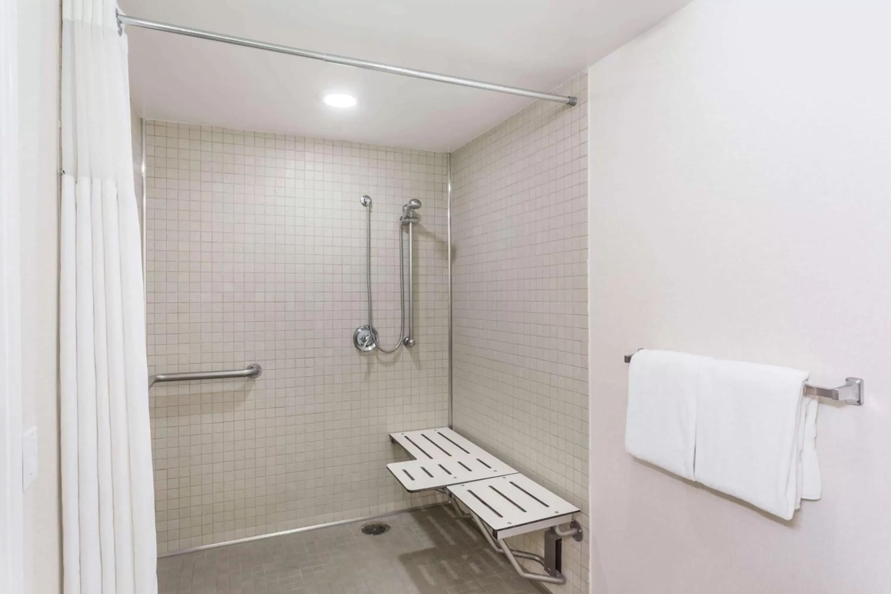 Shower, Bathroom in Wyndham Garden Fresno Yosemite Airport