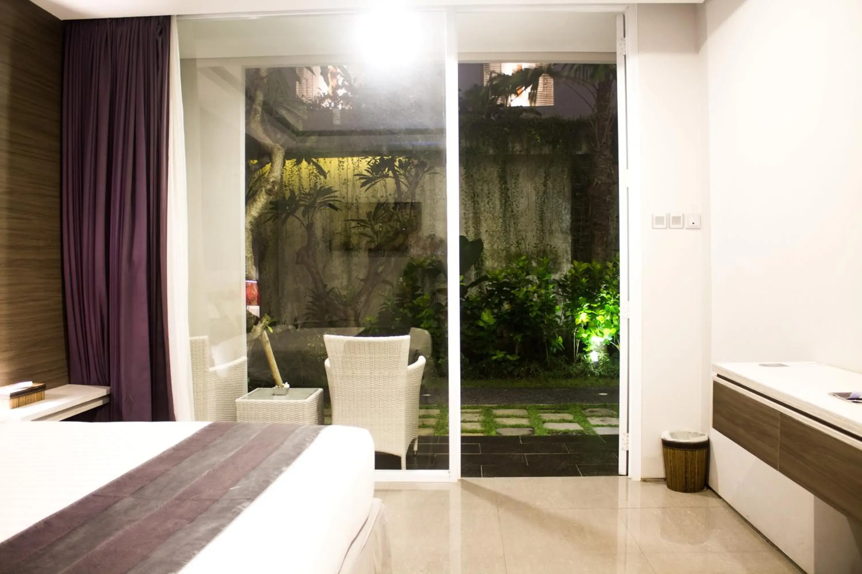 Bedroom in Transera Kamini Legian Hotel