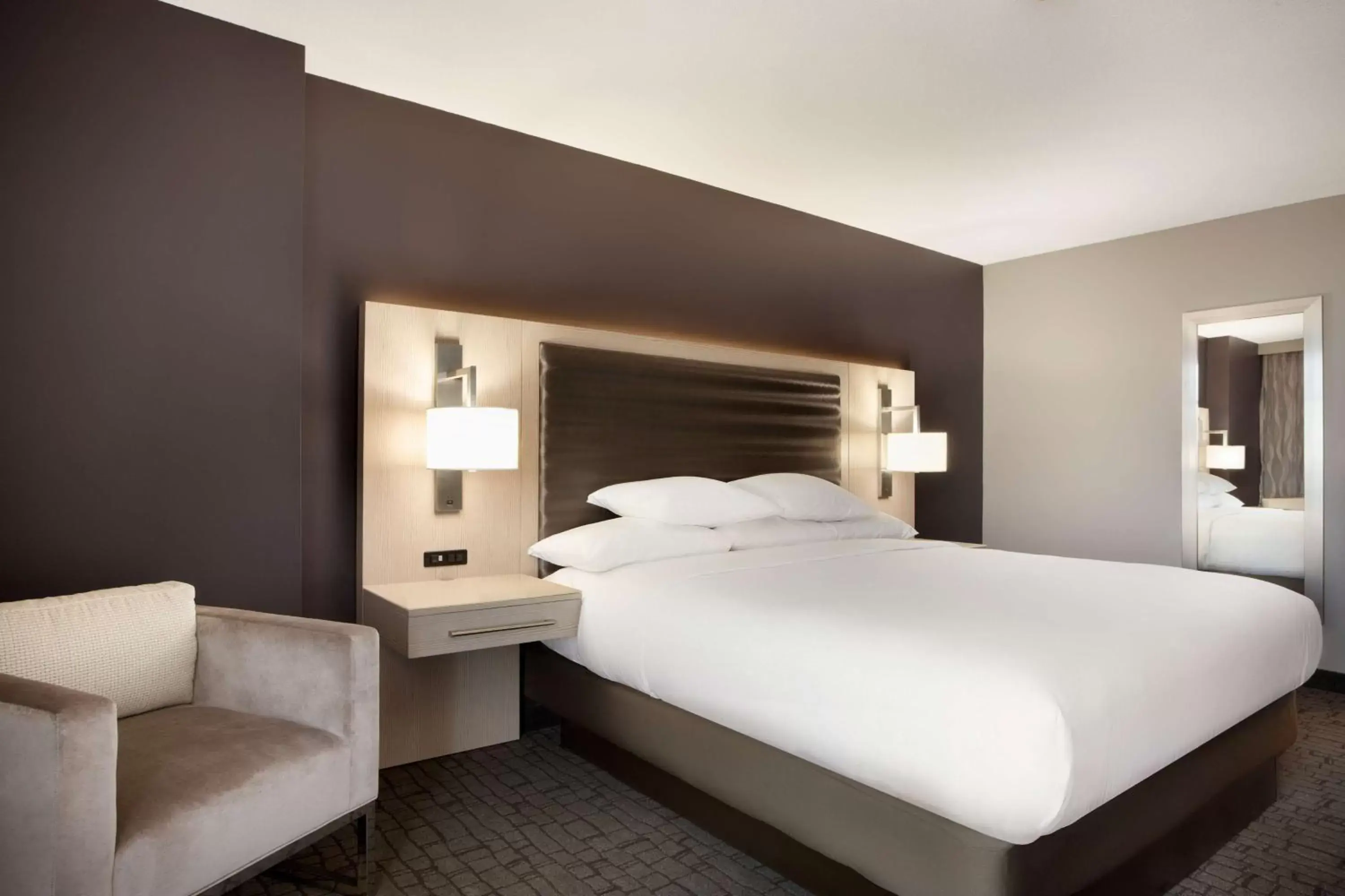 Bed in Embassy Suites by Hilton Charlotte Uptown