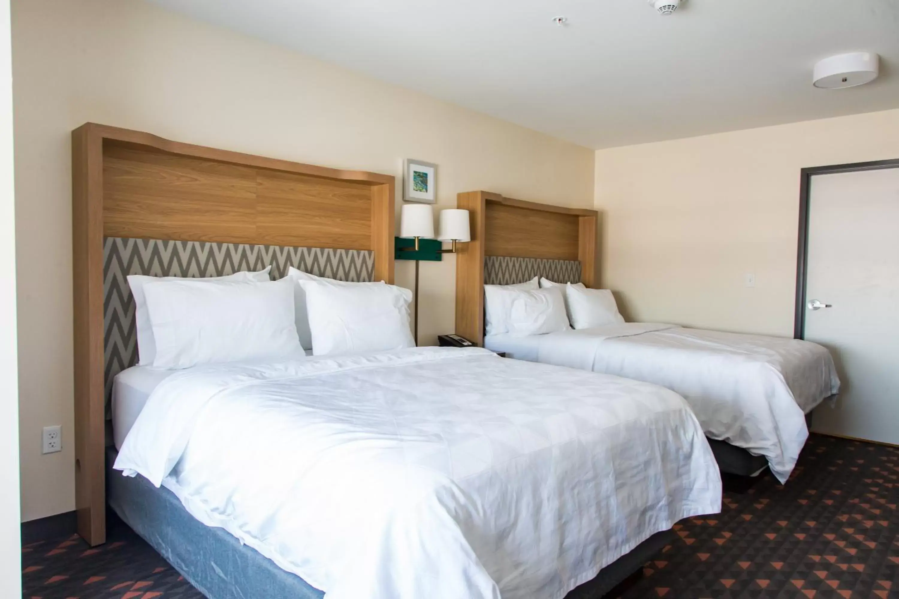 Photo of the whole room, Bed in Holiday Inn Hotel & Suites - Mount Pleasant, an IHG Hotel