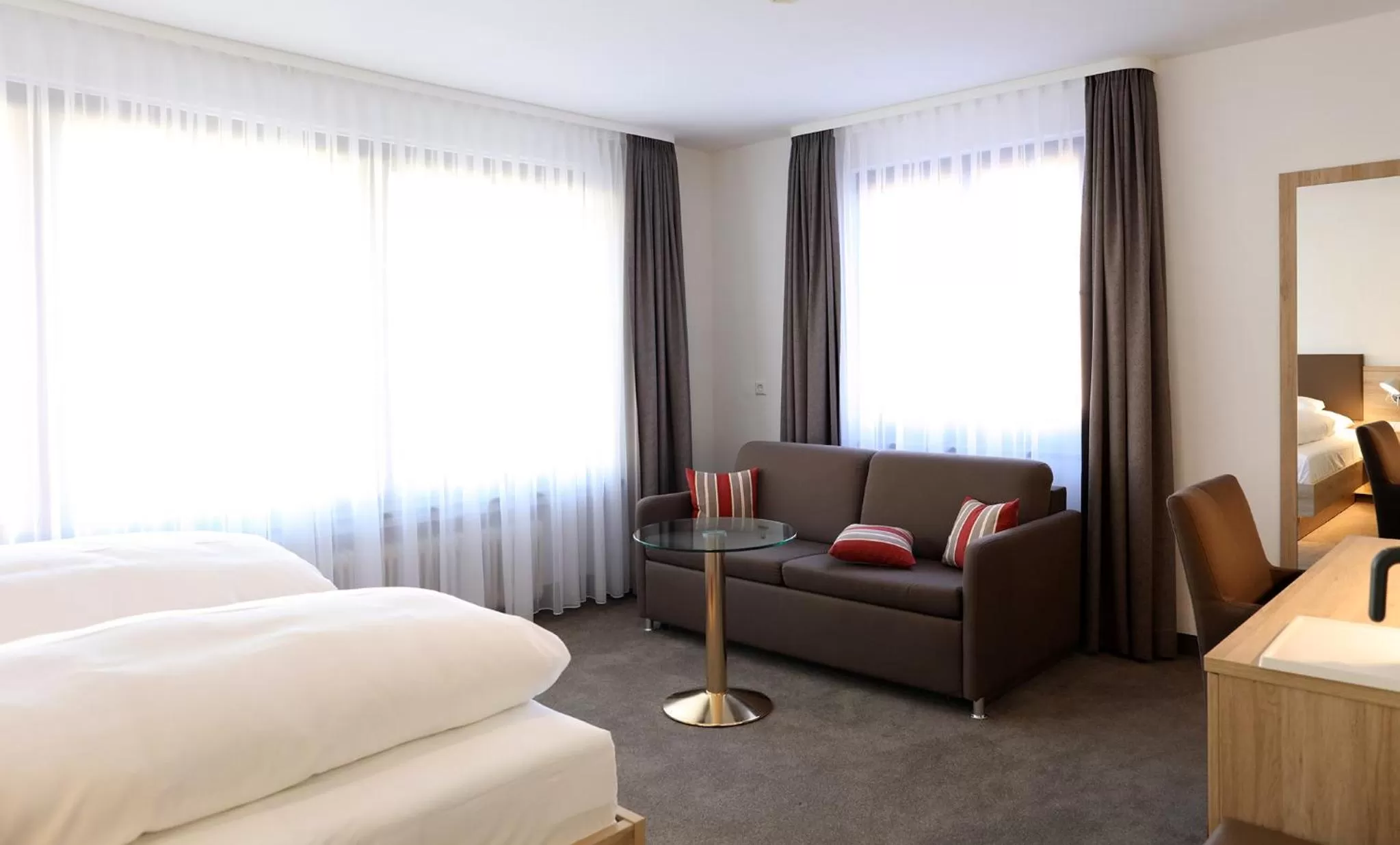 Seating area, Bed in Hotel Warteck
