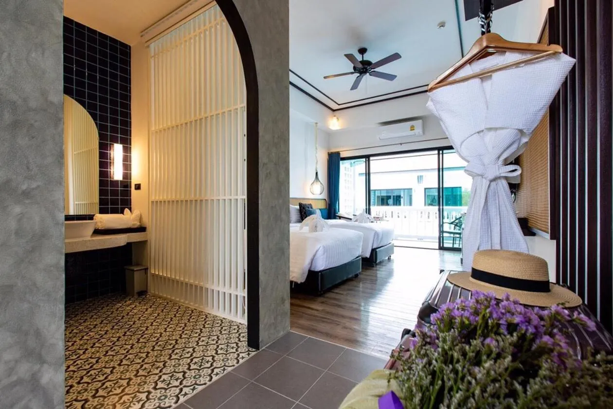 Bed in Chaanburi Boutique Resort