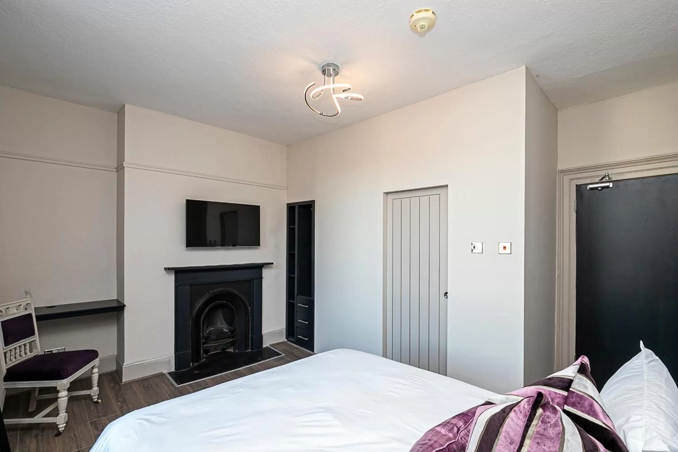 Bed in Pages Hotel and Guesthouse