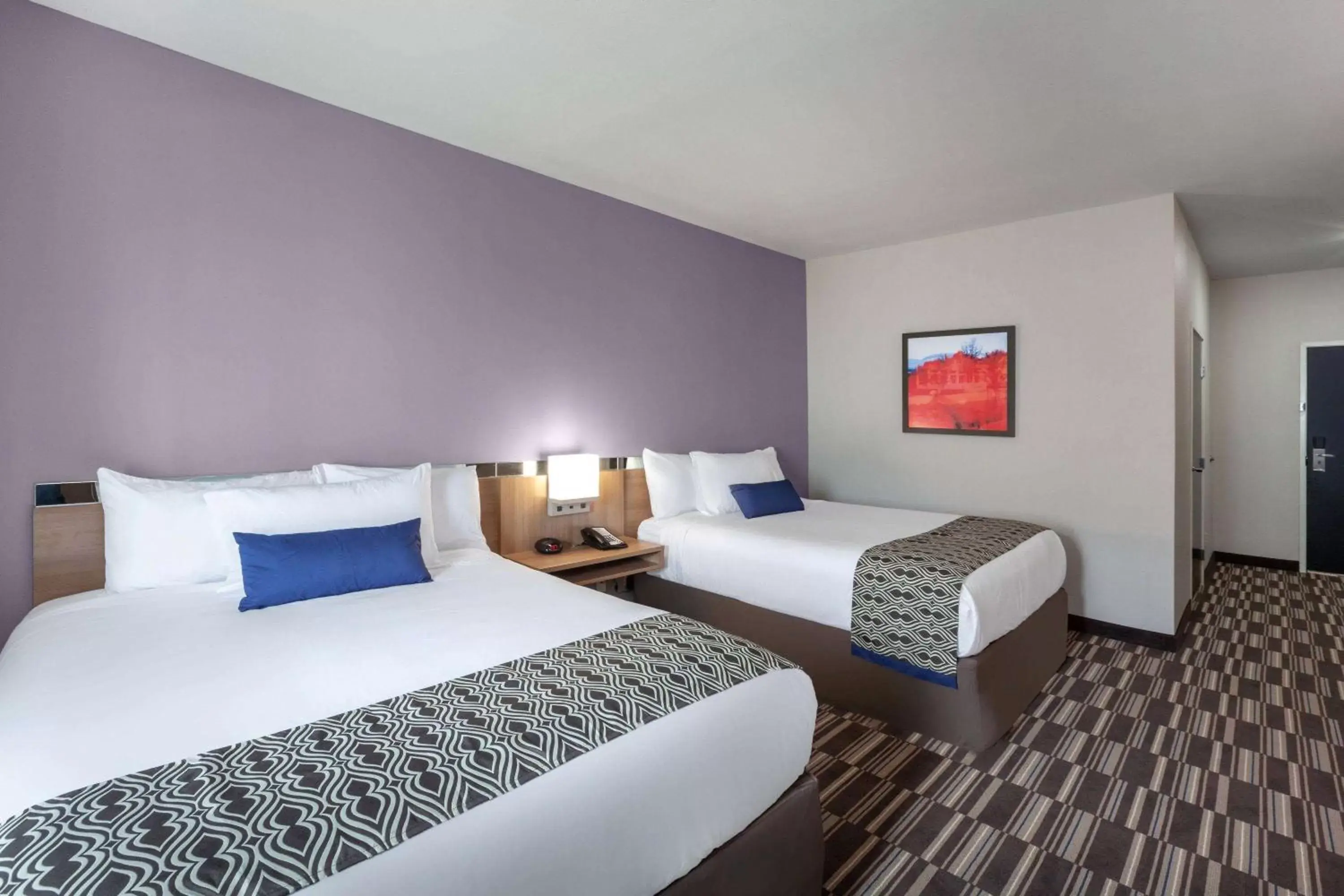 Photo of the whole room, Bed in Microtel Inn & Suites by Wyndham College Station