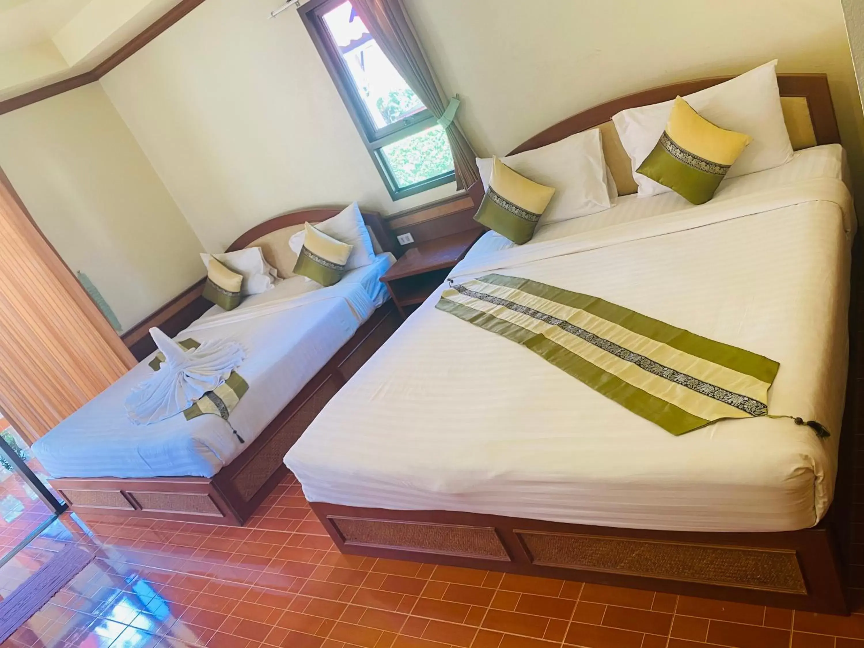 Bed in Kaibae Hut Resort
