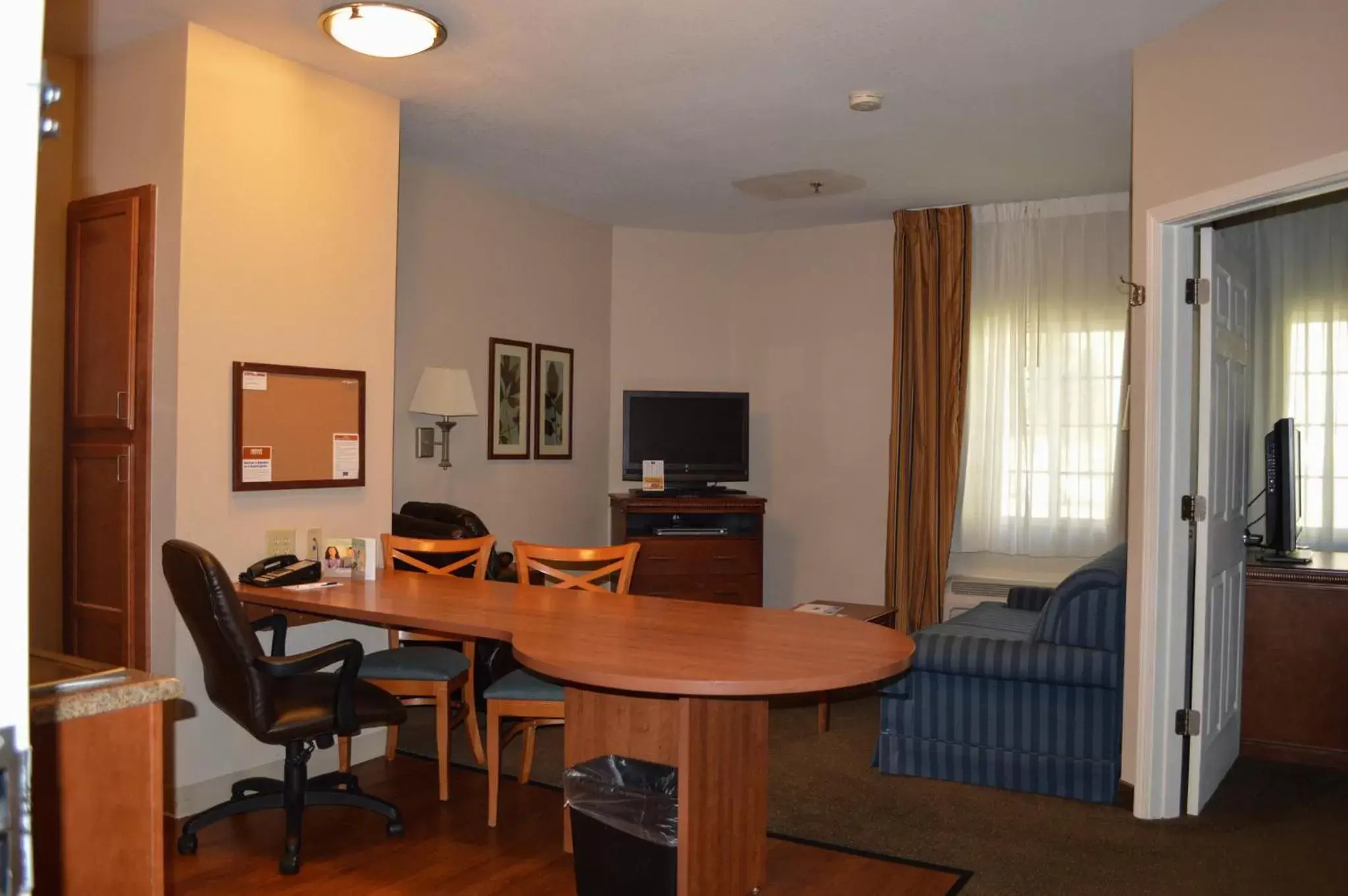 Photo of the whole room, TV/Entertainment Center in Candlewood Suites-Augusta, an IHG Hotel