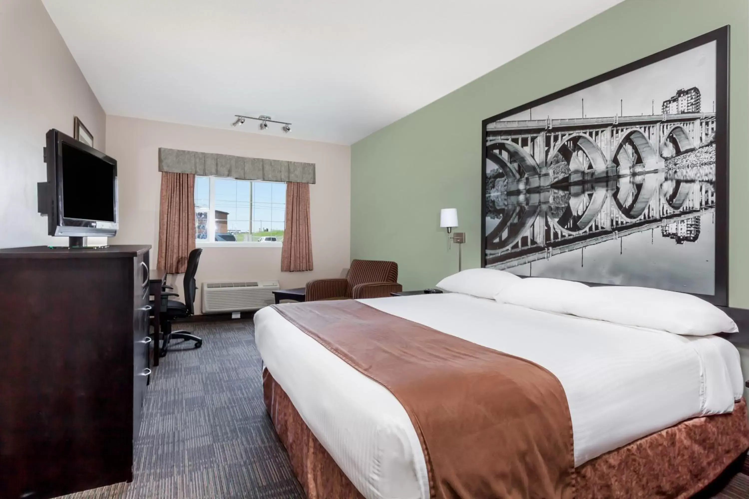 Bed in Super 8 by Wyndham Saskatoon Near Saskatoon Airport