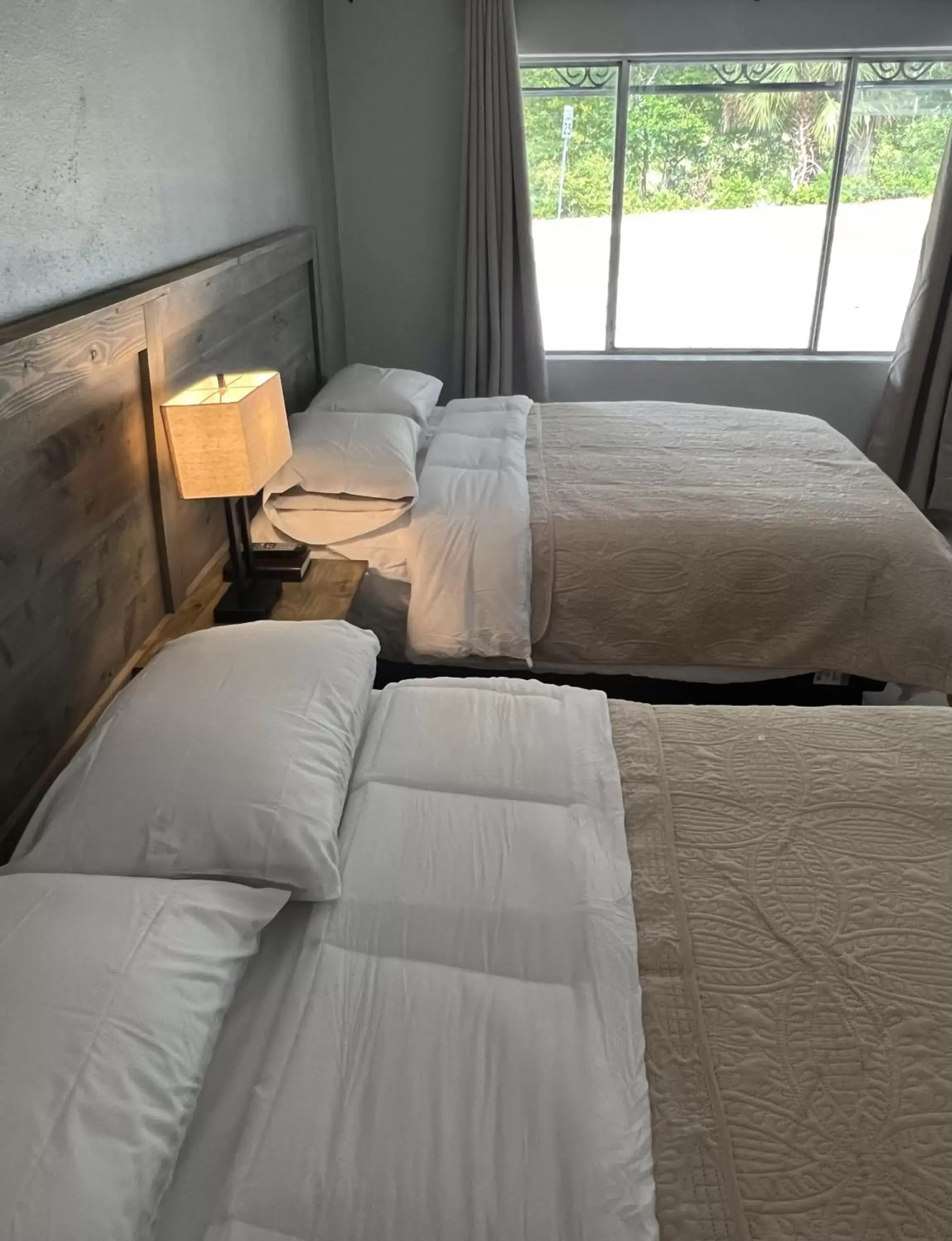 Bed in BlueGem Motel