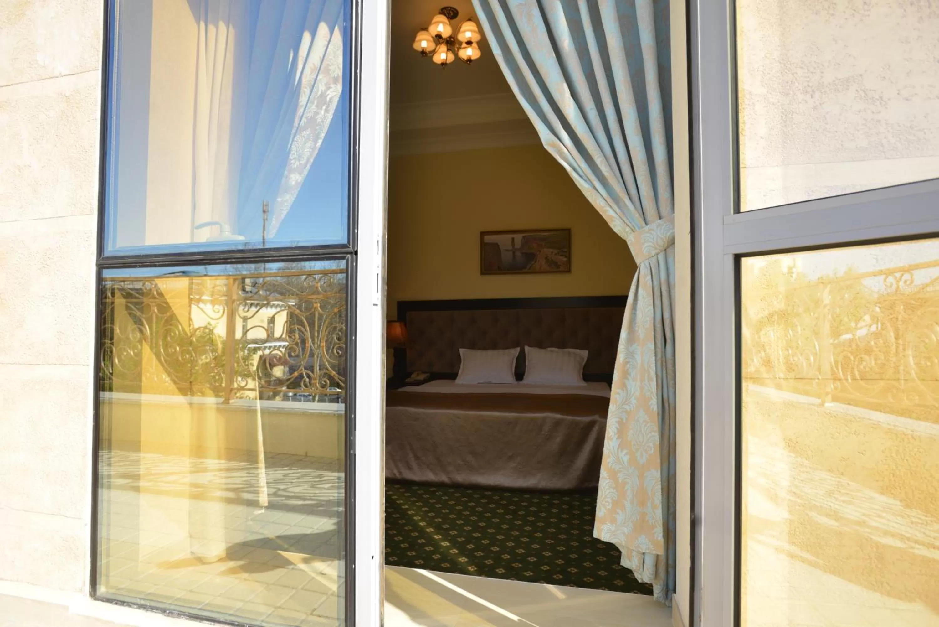 Balcony/Terrace, Bed in Gloria Hotel