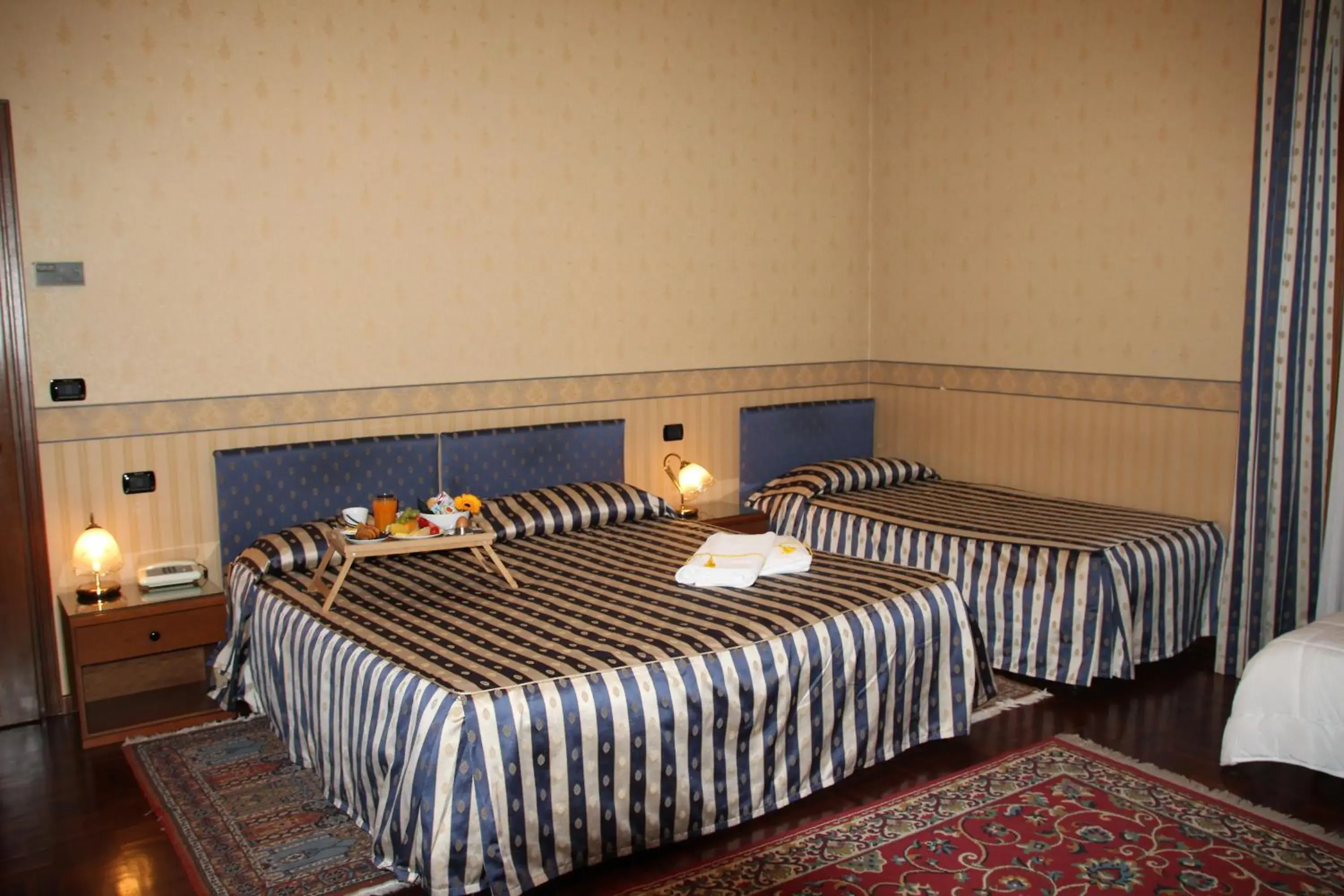 Photo of the whole room, Bed in Albergo Ristorante Leon d'Oro