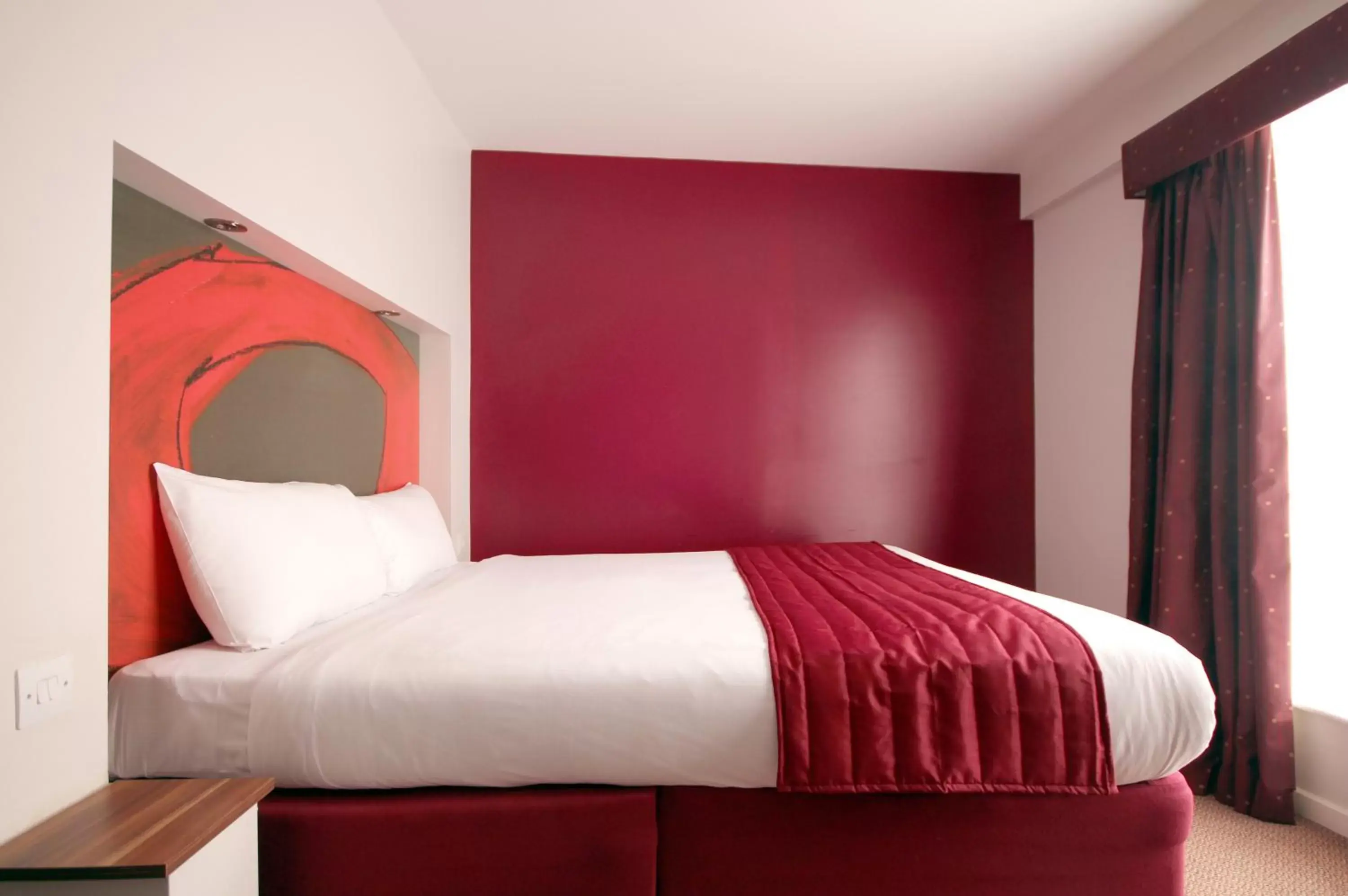 Bed in Ramada London Stansted Airport