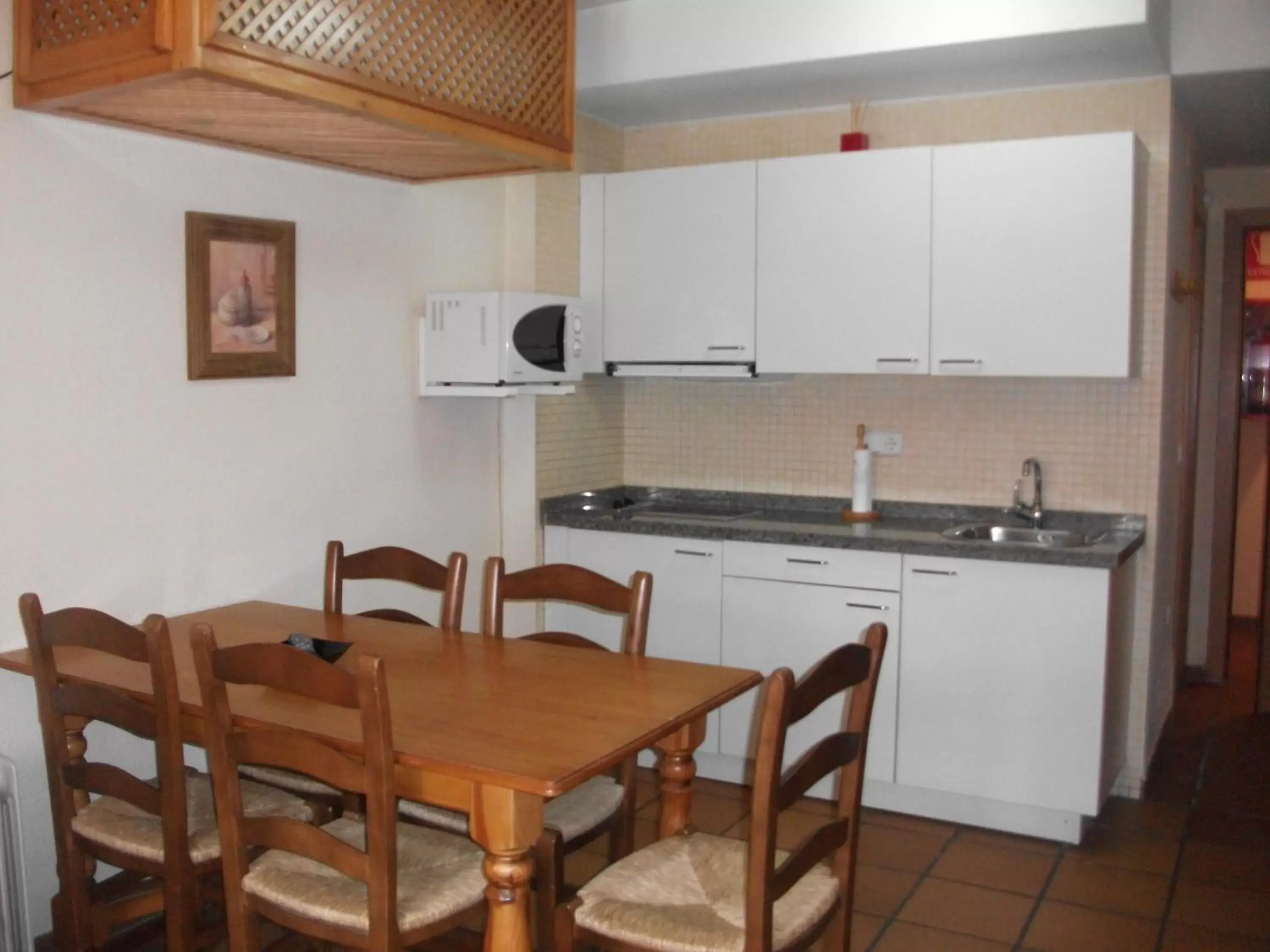 Kitchen or kitchenette, Dining Area in Apartamentos Sierra Nevada Welcome