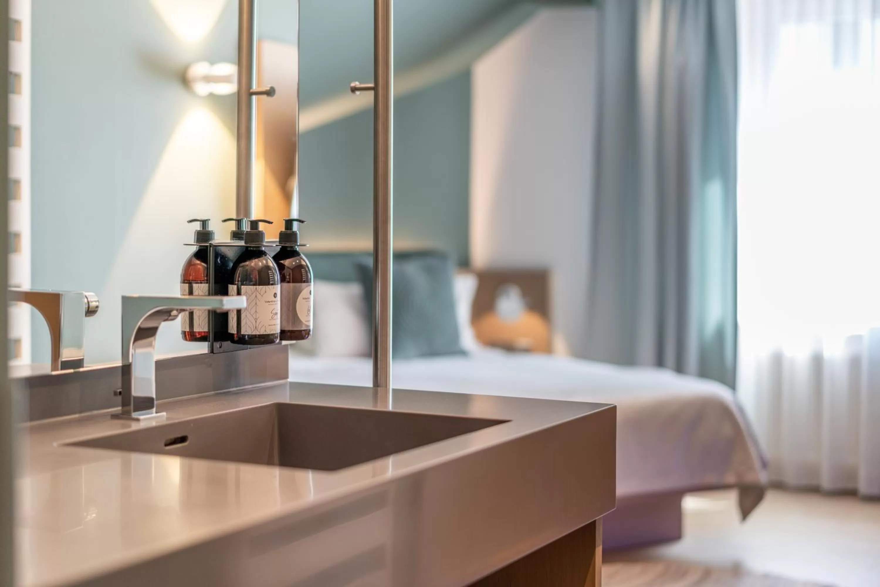 Bathroom, Bed in hirschen dornbirn - das boutiquestyle hotel - skyrelax & wellness im rooftop