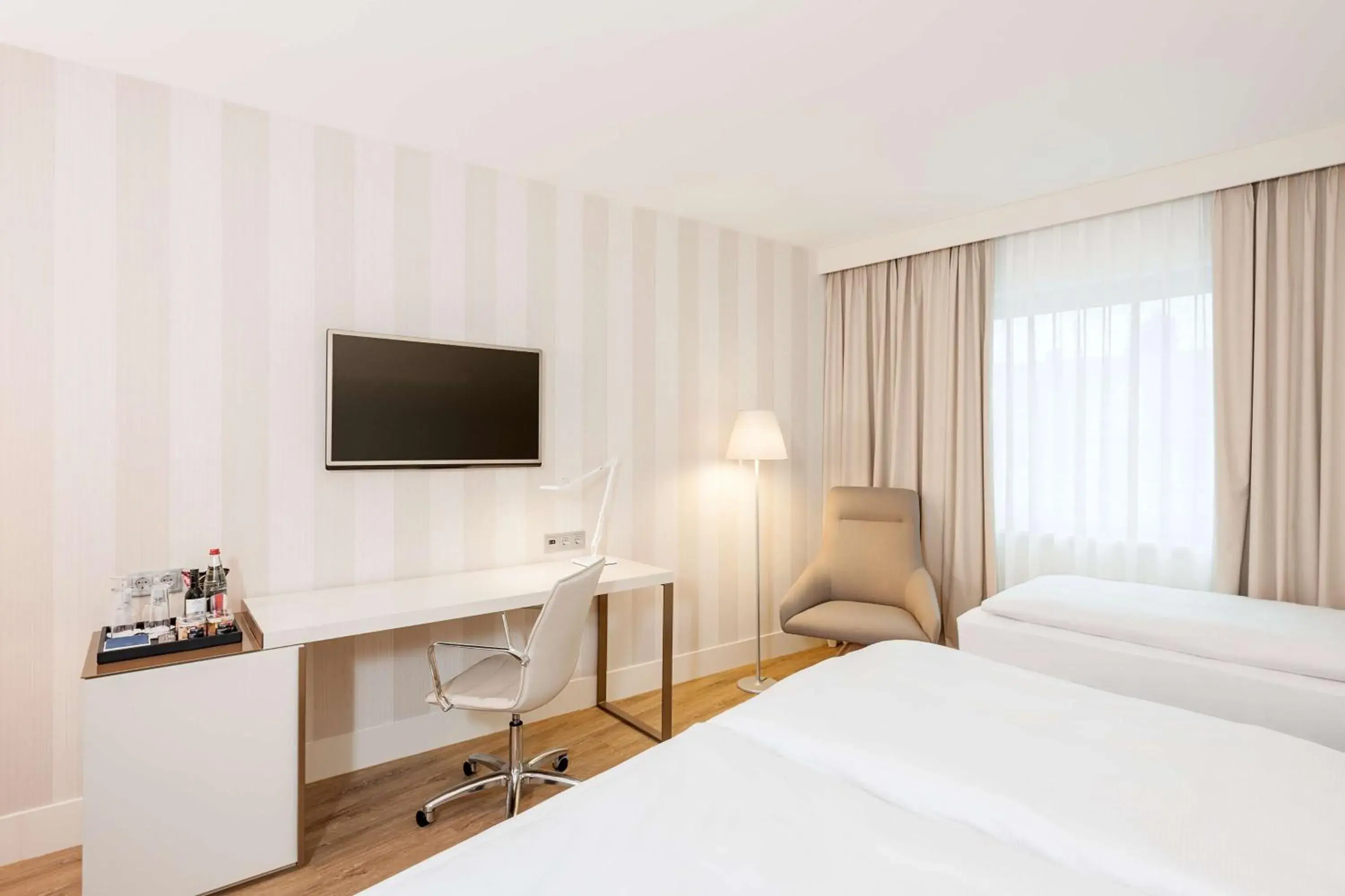 Standard Double or Twin Room with View with Extra Bed (2 Adults + 1 Child) in NH Graz City Standard Double or Twin Room with View with Extra Bed (2 Adults + 1 Child) in NH Graz City