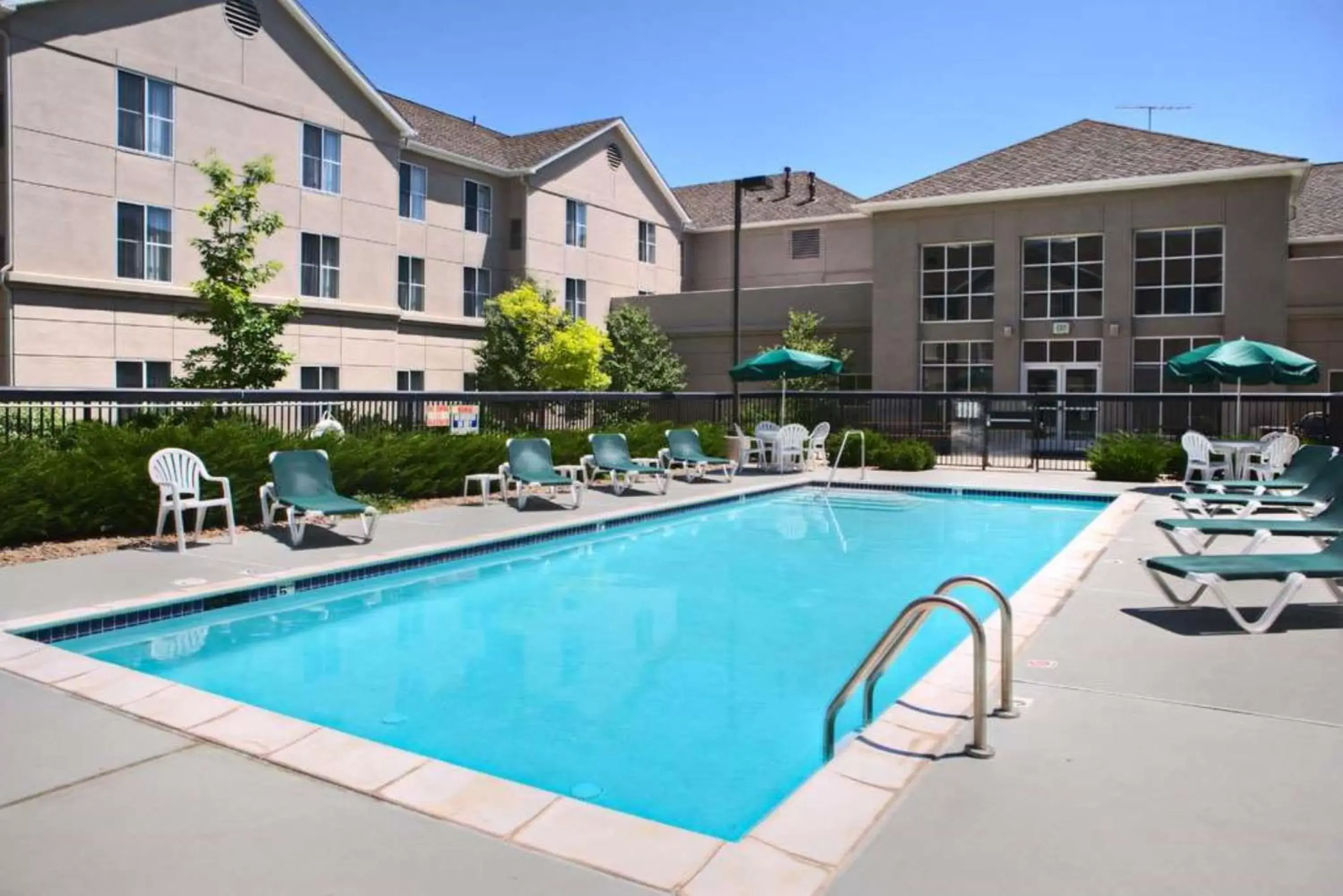 Swimming pool, Property Building in Homewood Suites by Hilton Colorado Springs-North