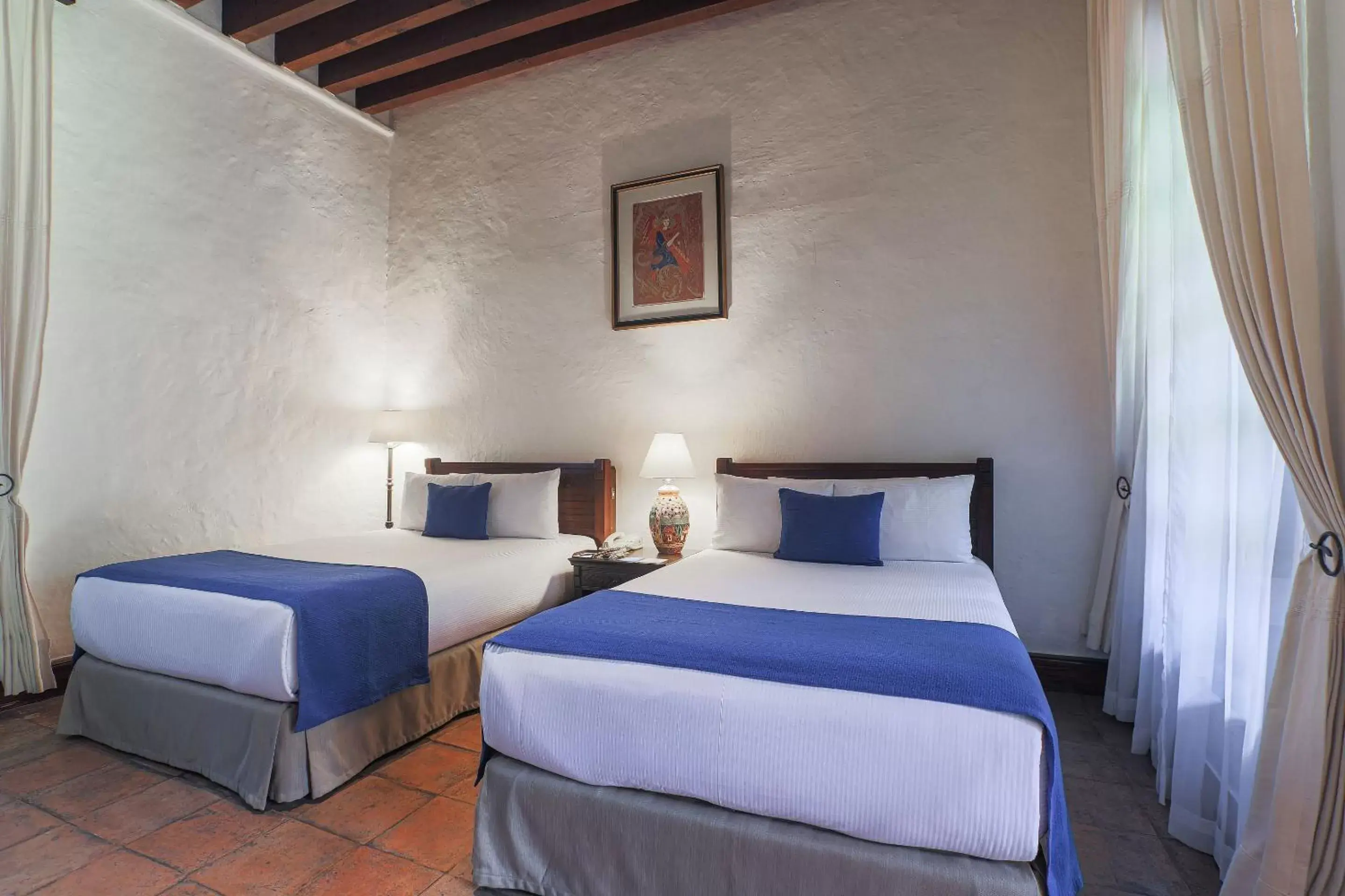 Photo of the whole room, Bed in Quinta Real Oaxaca