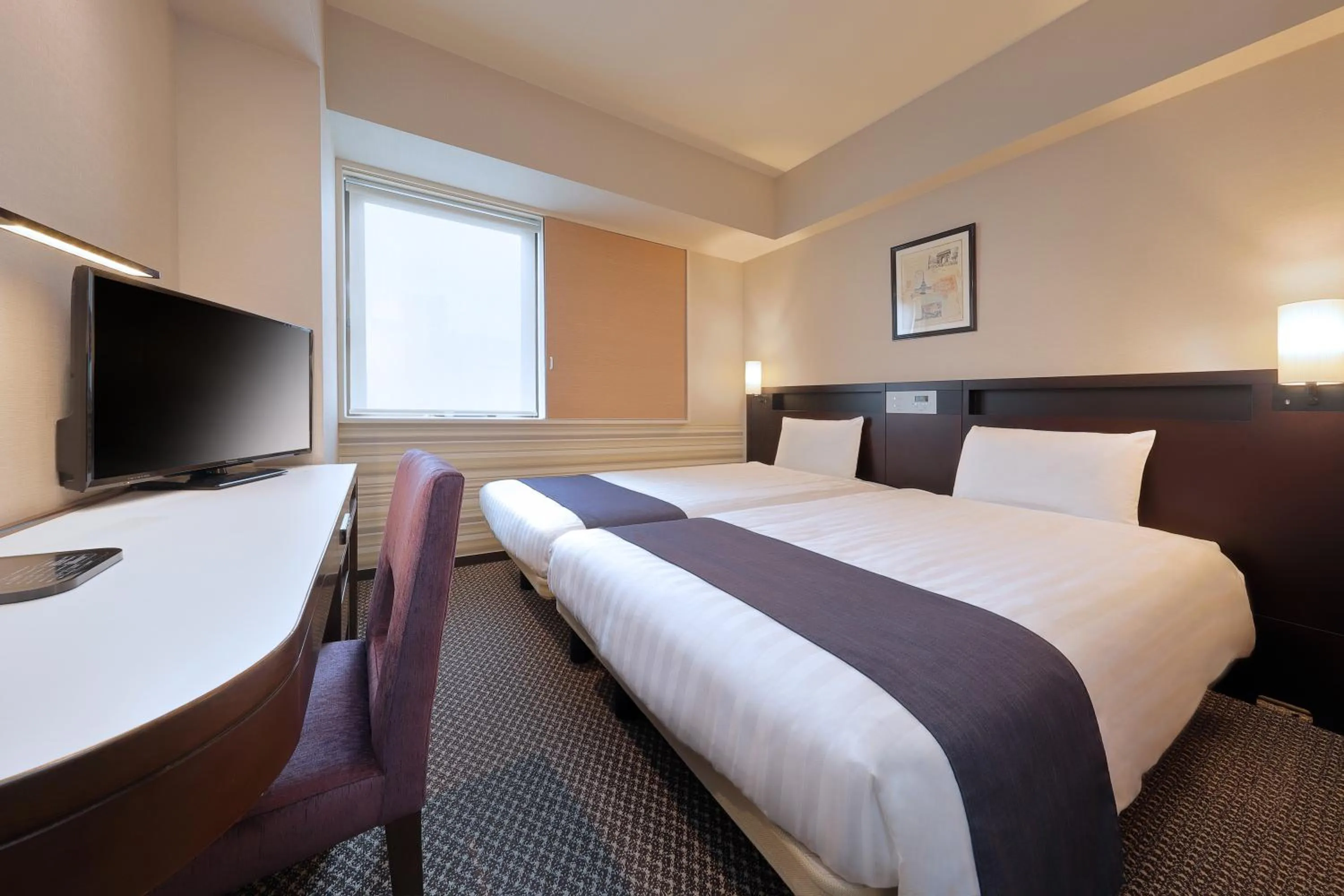 Bed in Keio Presso Inn Shinjuku