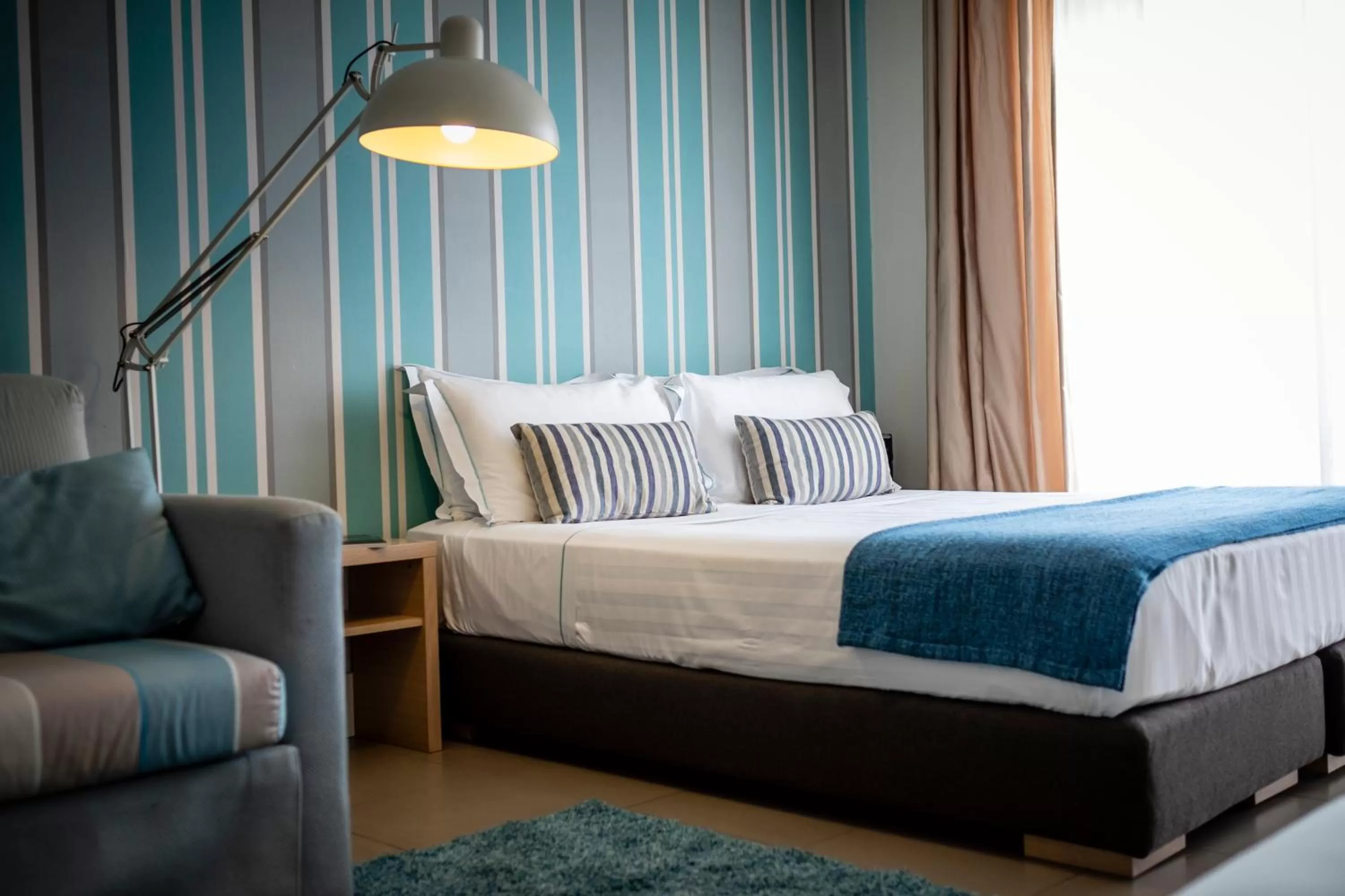 Bed in Le Rose Spa Hotel