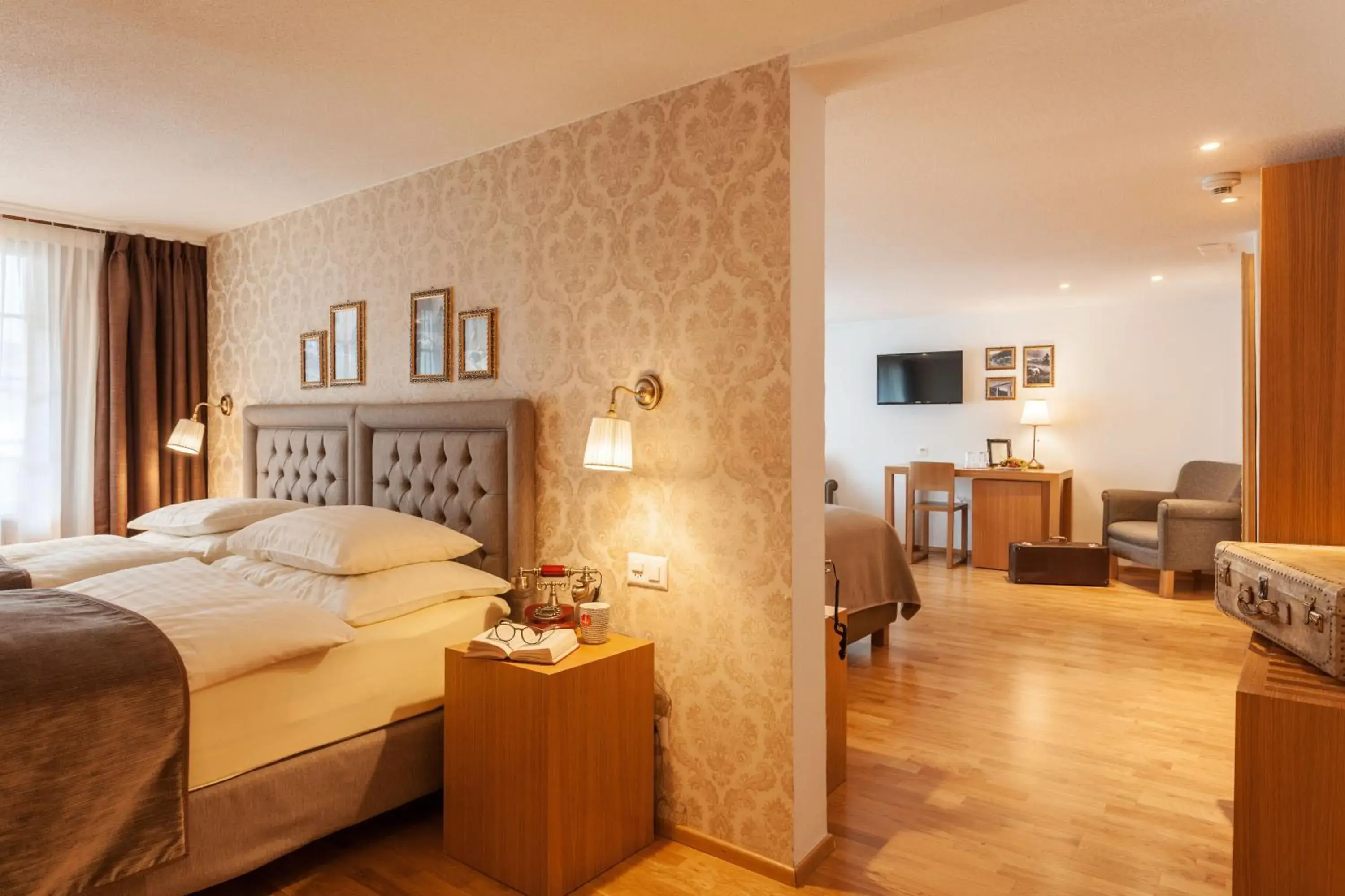 Photo of the whole room, Bed in Hotel Walliserhof Zermatt