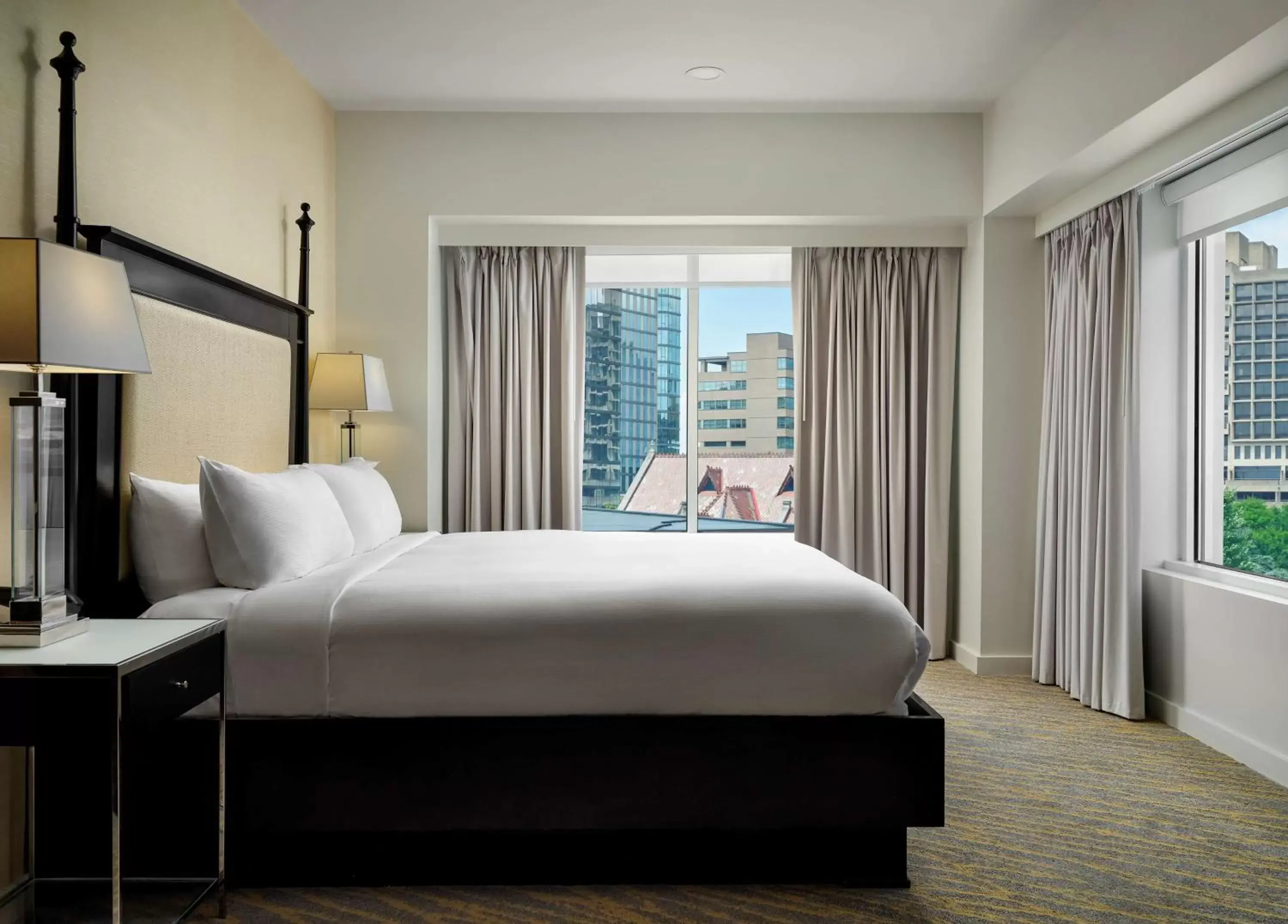 Bed in The Inn at Penn, A Hilton Hotel